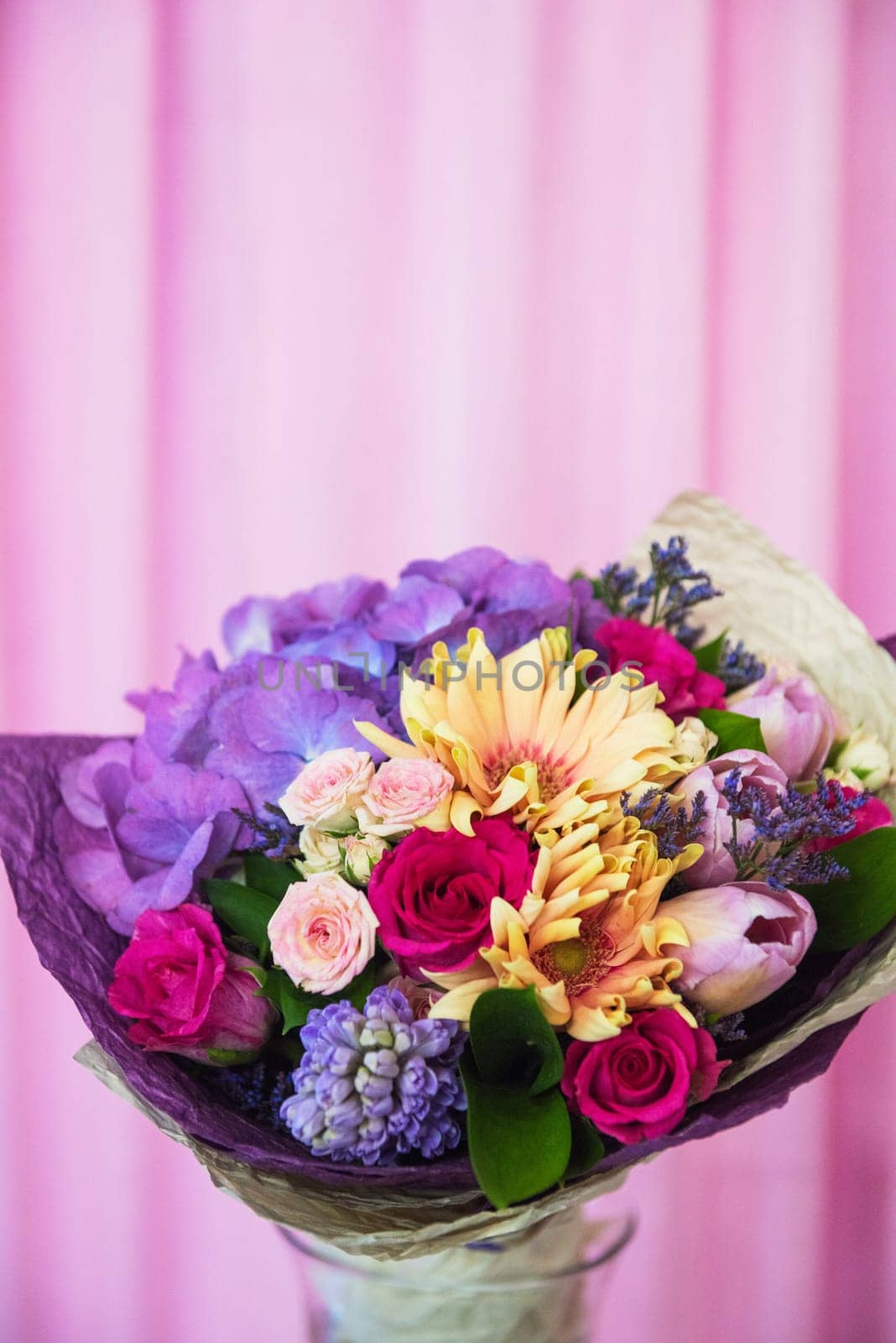 beautiful wedding bouquet on pink background