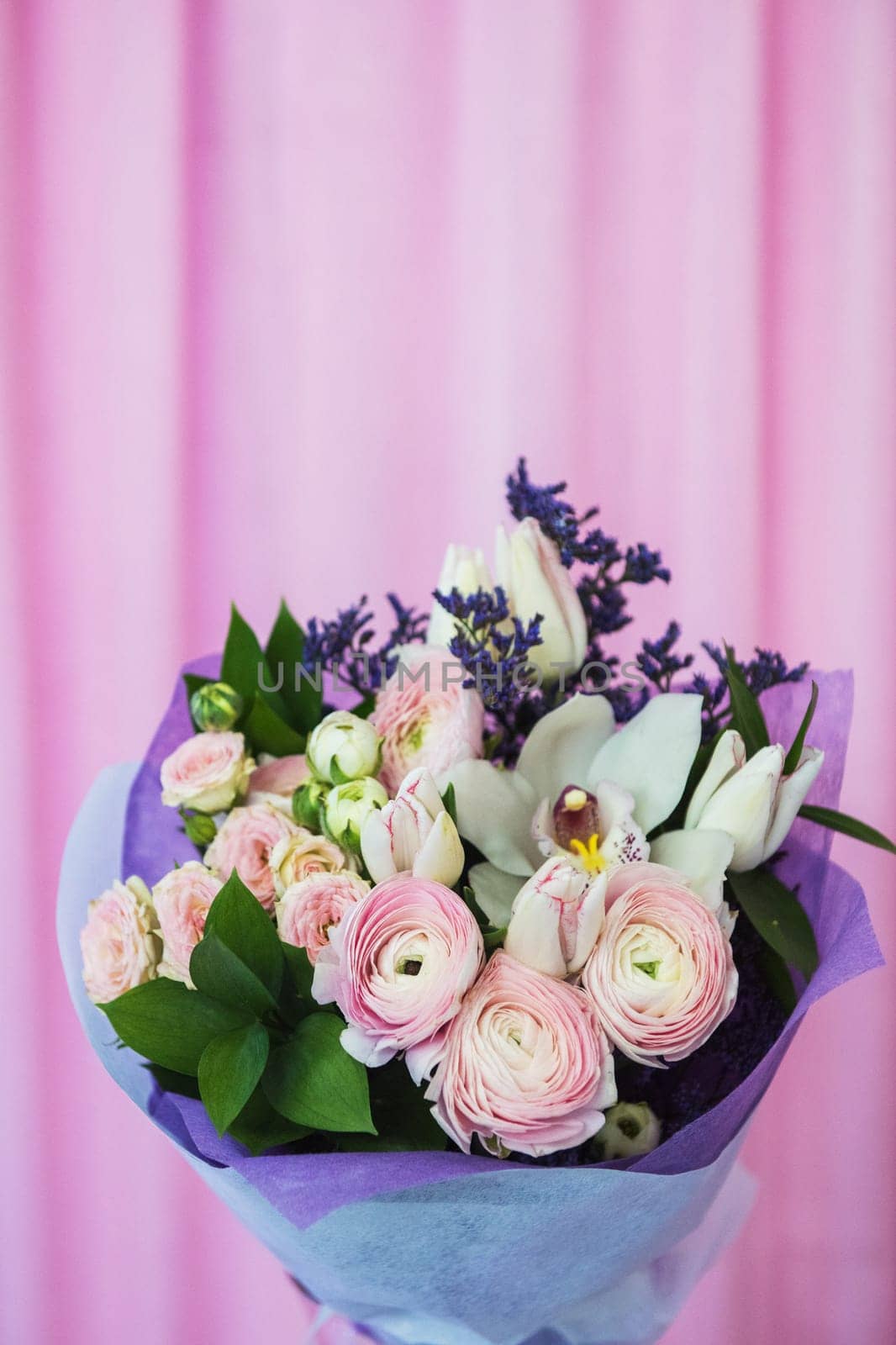 beautiful wedding bouquet on pink background