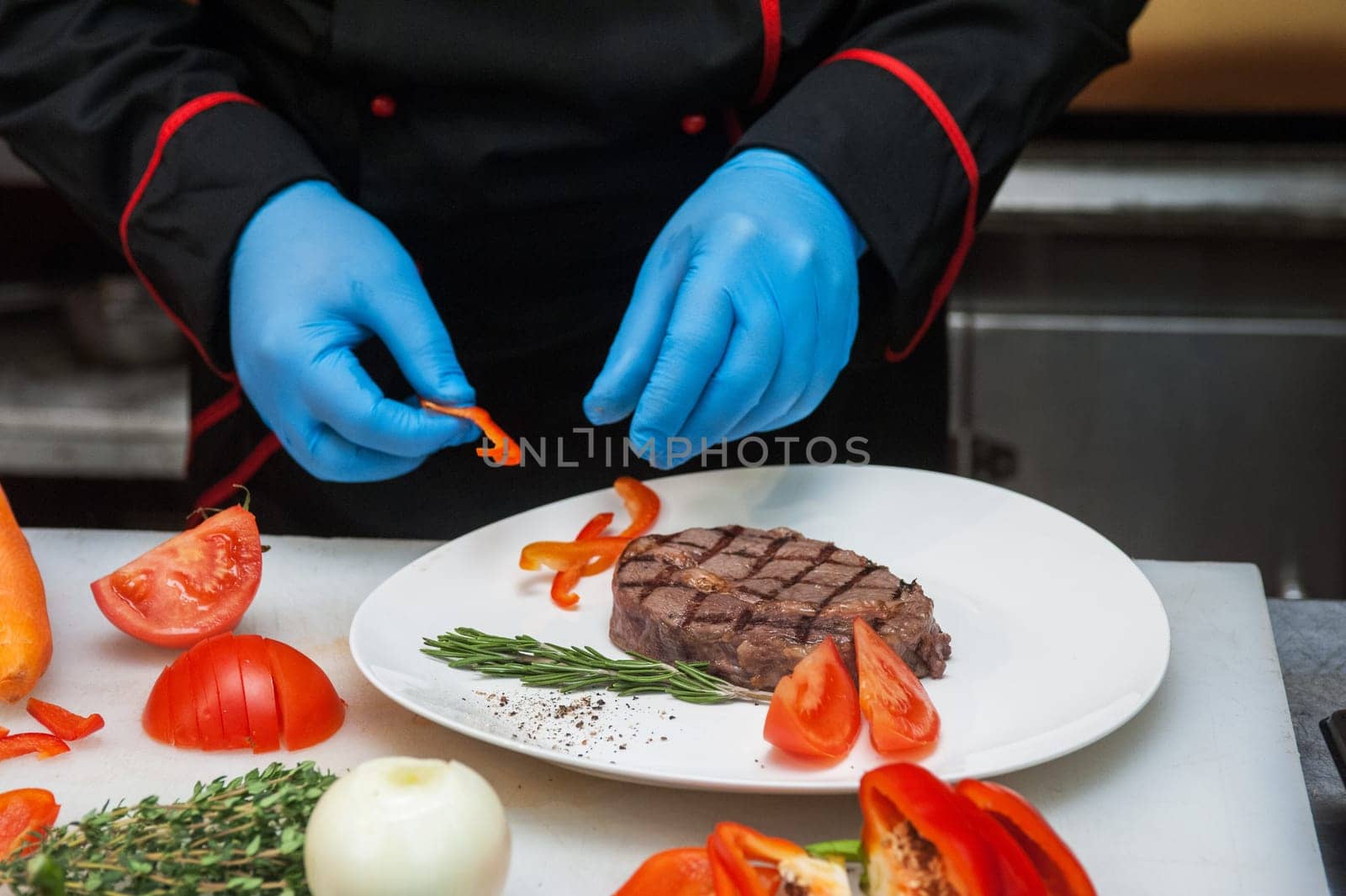 Chef set grilled meat steak on the plate