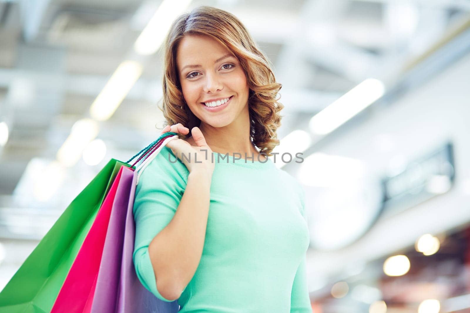 Cute shopaholic with shopping bags