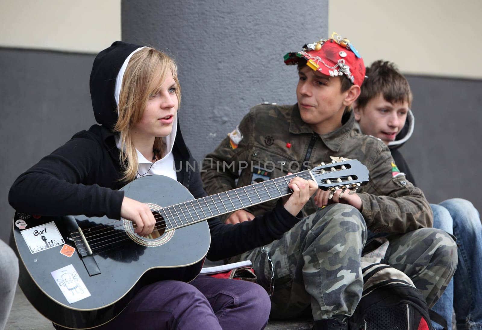 Kids play music and dance in the City Vilnius with the Cityhall  in the Baltic State of Lithuania