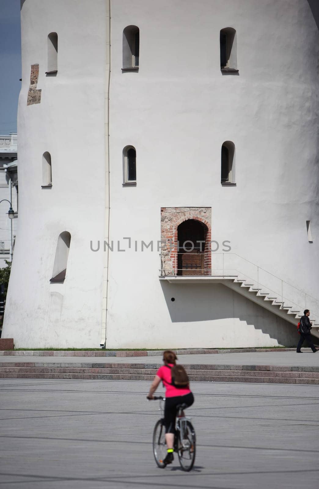 The old Town of the City Vilnius with the clocktower and the Johanneschurch in the Baltic State of Lithuania