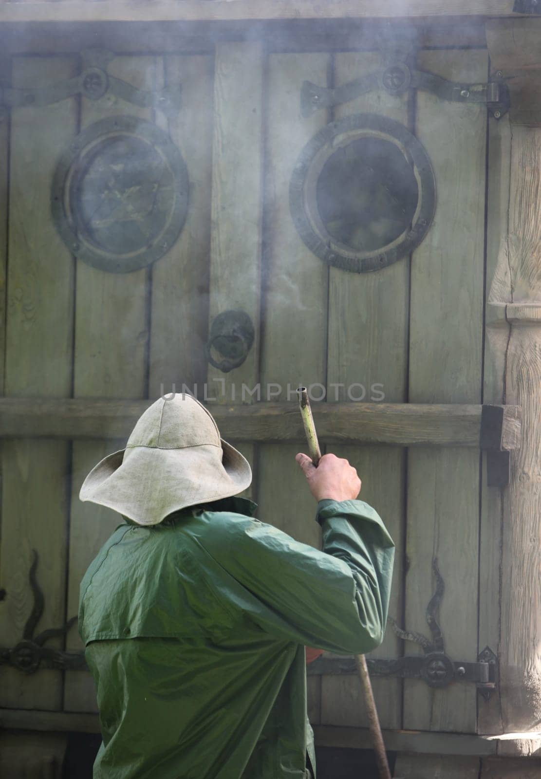 fresh fish getting smoket on a Summer Festival in a Parc in the old City of Vilnius in the Baltic State of Lithuania