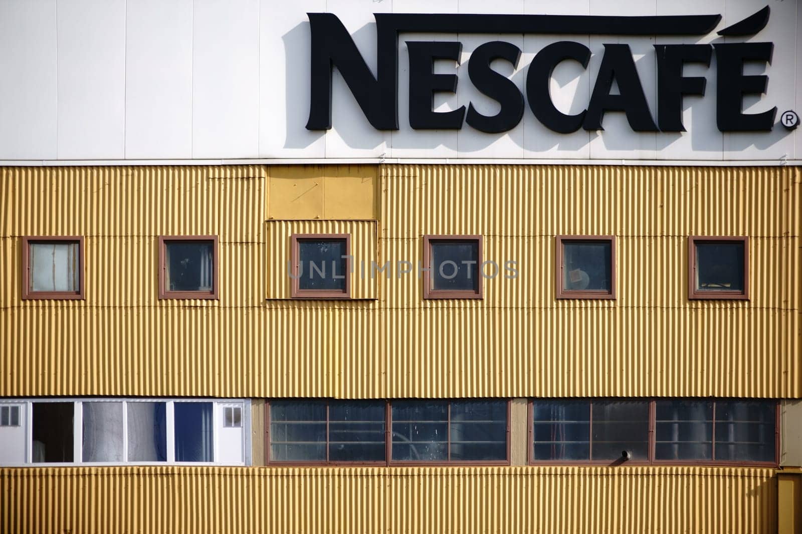 Mainz,Germany - March 24,2014: The façade of the industrial building of the beverage and coffee manufacturer Nescafe with logo on March 24,2017 in Mainz.