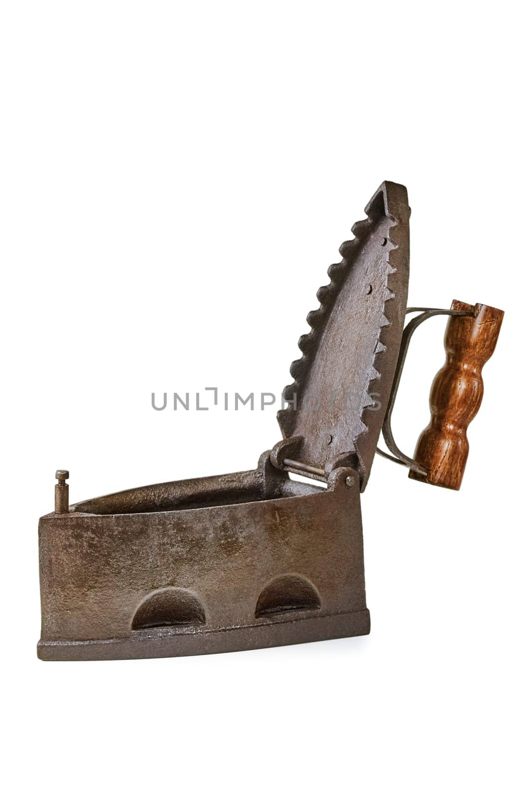 Old Smoothing Iron Over The White Background
