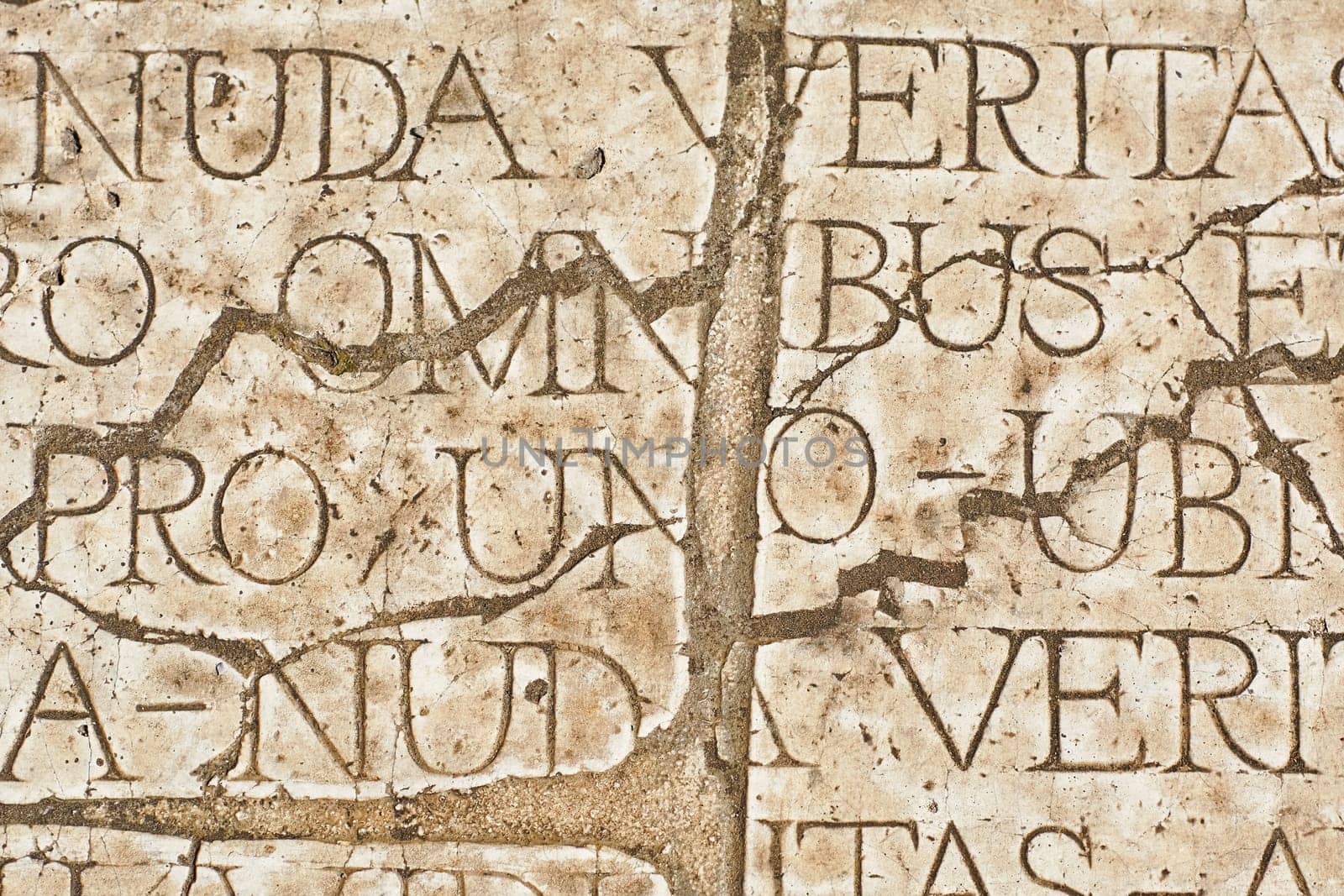 Background of an Old Cracked Wall  with Latin Inscriptions