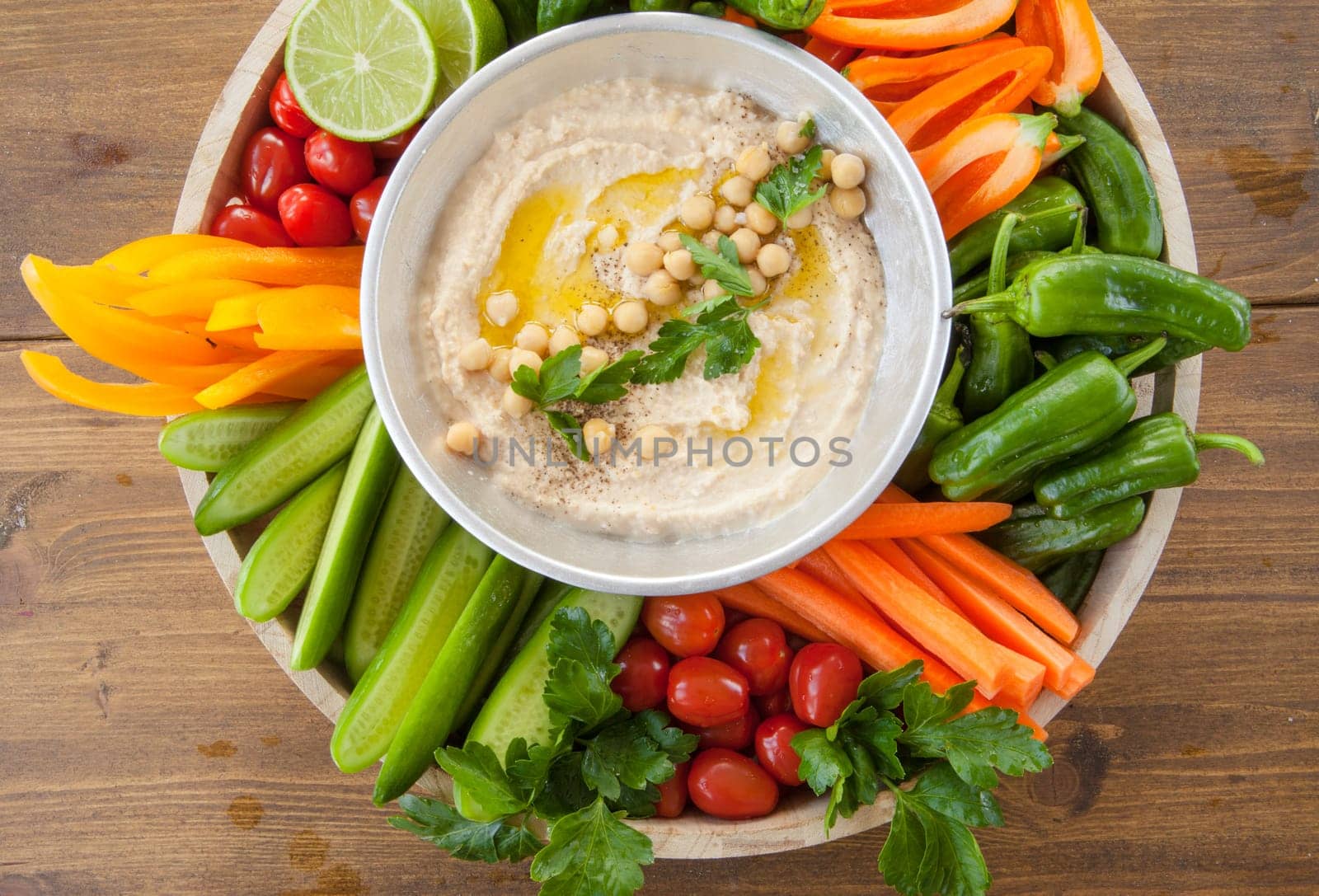 Homemade hummus and fresh vegetables for dipping