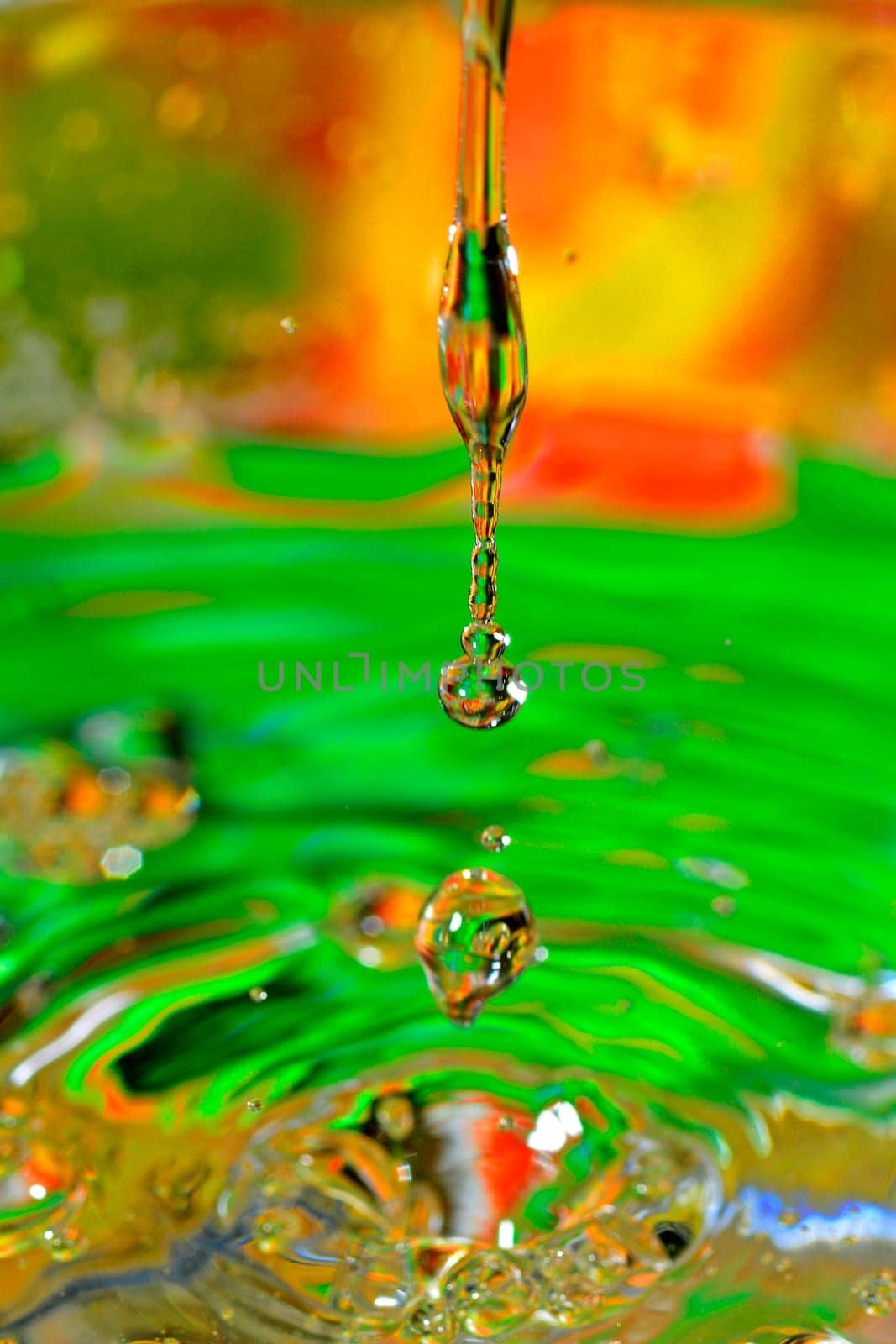 Water droplets fall into basins