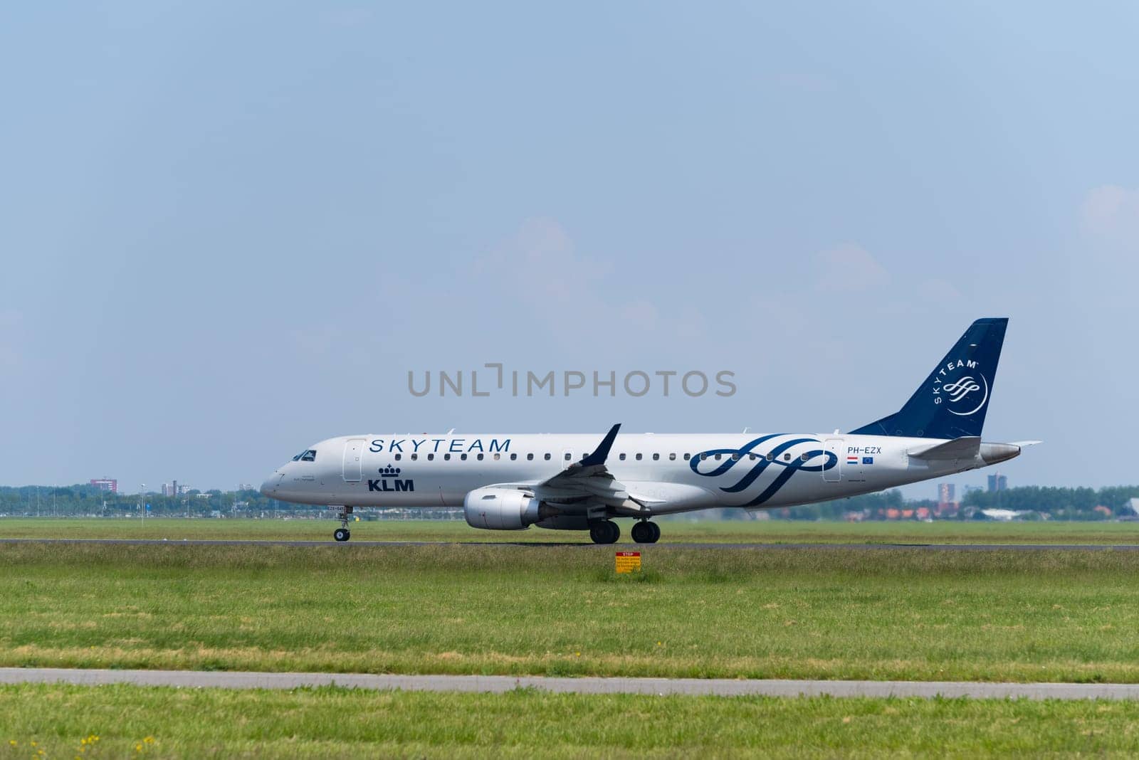 SCHIPHOL, NETHERLANDS - JUNE 4, 2016: A KLM Skyteam plane takes off at amsterdam international airport. SkyTeam is an alliance between different global airlines