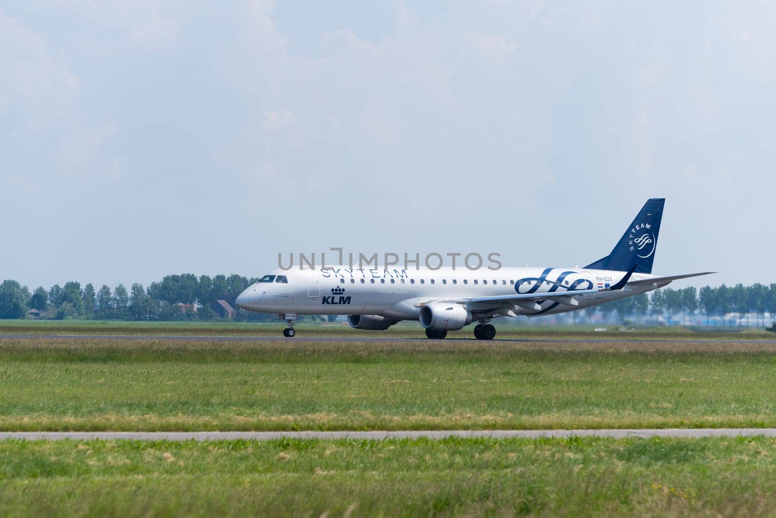 SCHIPHOL, NETHERLANDS - JUNE 4, 2016: A KLM Skyteam plane takes off at amsterdam international airport. SkyTeam is an alliance between different global airlines