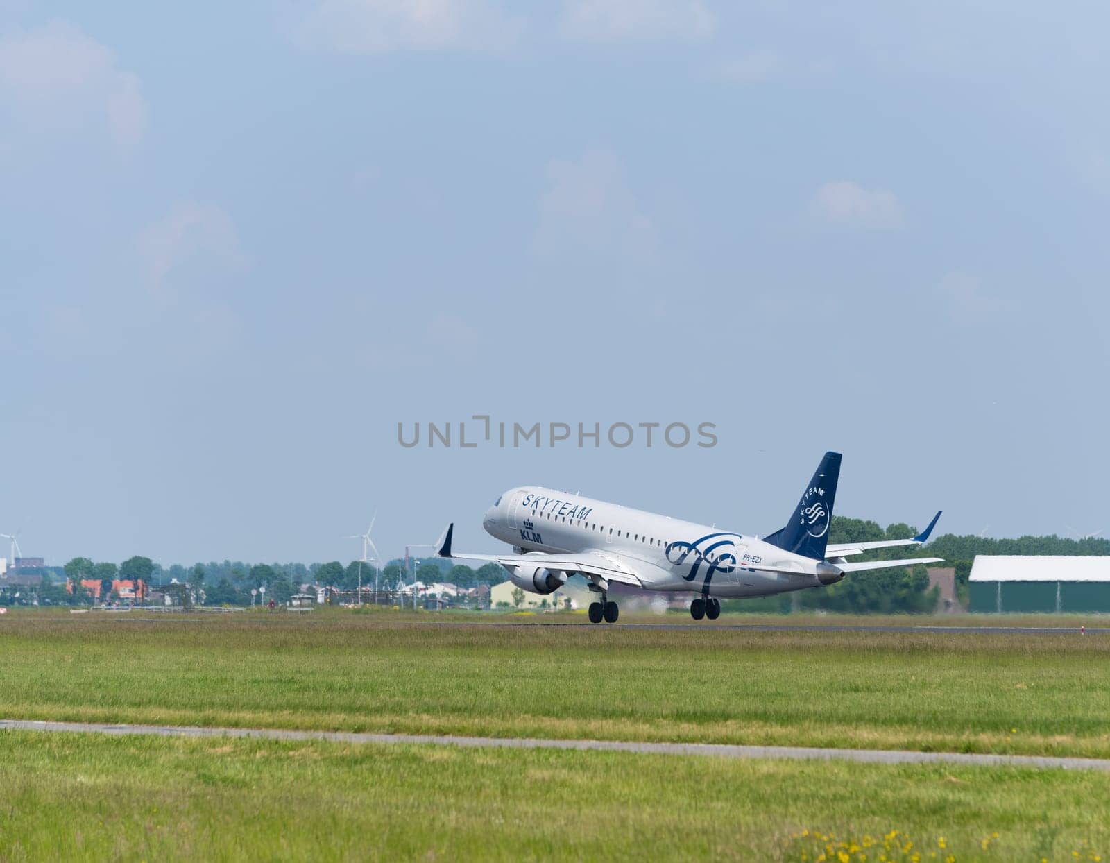 SCHIPHOL, NETHERLANDS - JUNE 4, 2016: A KLM Skyteam plane takes off at amsterdam international airport. SkyTeam is an alliance between different global airlines