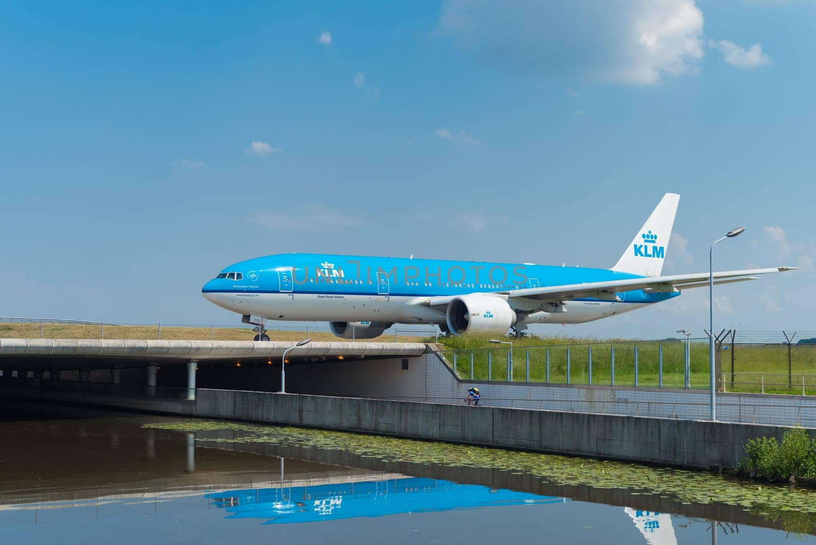 SCHIPHOL, NETHERLANDS - JUNE 4, 2016: Air France-KLM airplane taxiing to the runway on amsterdam schiphol airport