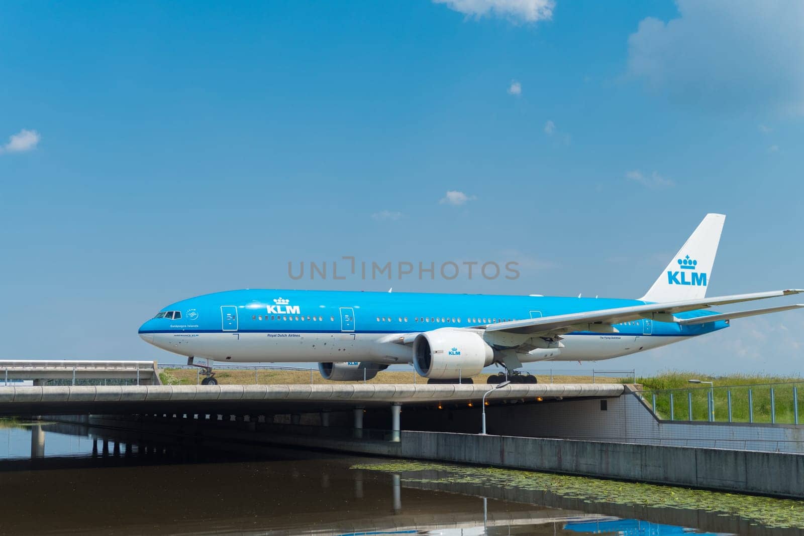 SCHIPHOL, NETHERLANDS - JUNE 4, 2016: Air France-KLM airplane taxiing to the runway on amsterdam schiphol airport