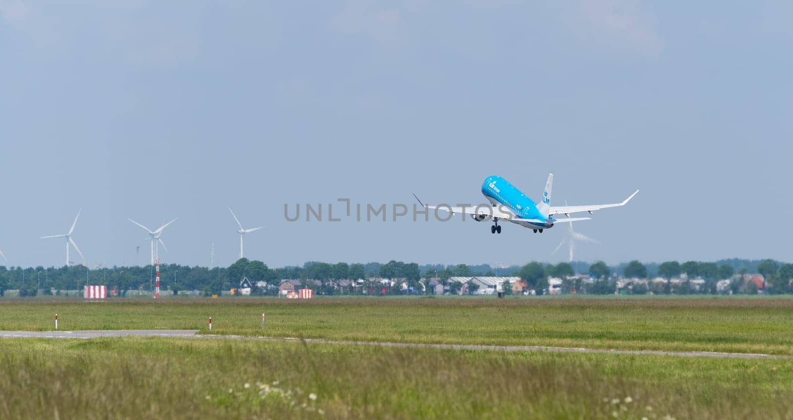 SCHIPHOL, NETHERLANDS - JUNE 4, 2016: KLM airplane takes off at amsterdam international airport. There are 163 destinations served by KLM