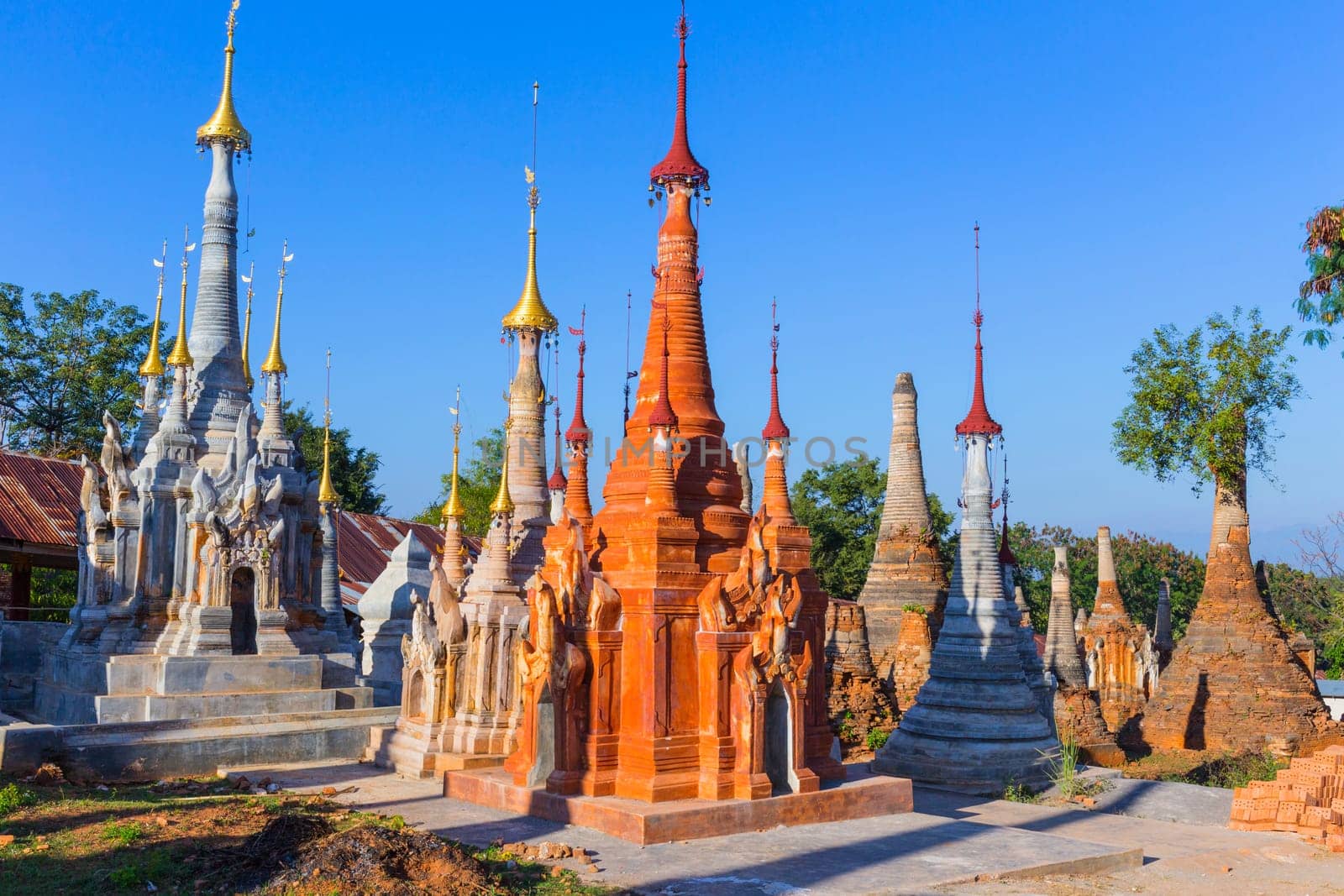 Ruins of ancient Burmese Buddhist pagodas Nyaung Ohak in the village of Indein on Inlay Lake in Shan State, Myanmar, Burma)