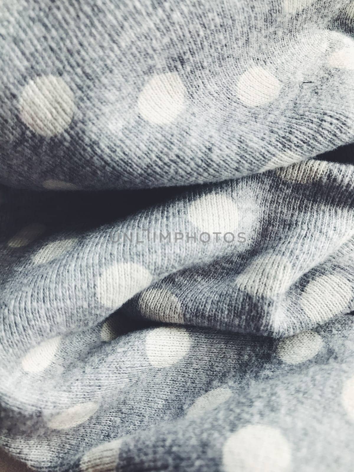 Textile fabric background. Ð¡asual simple everyday dotted polka clothers