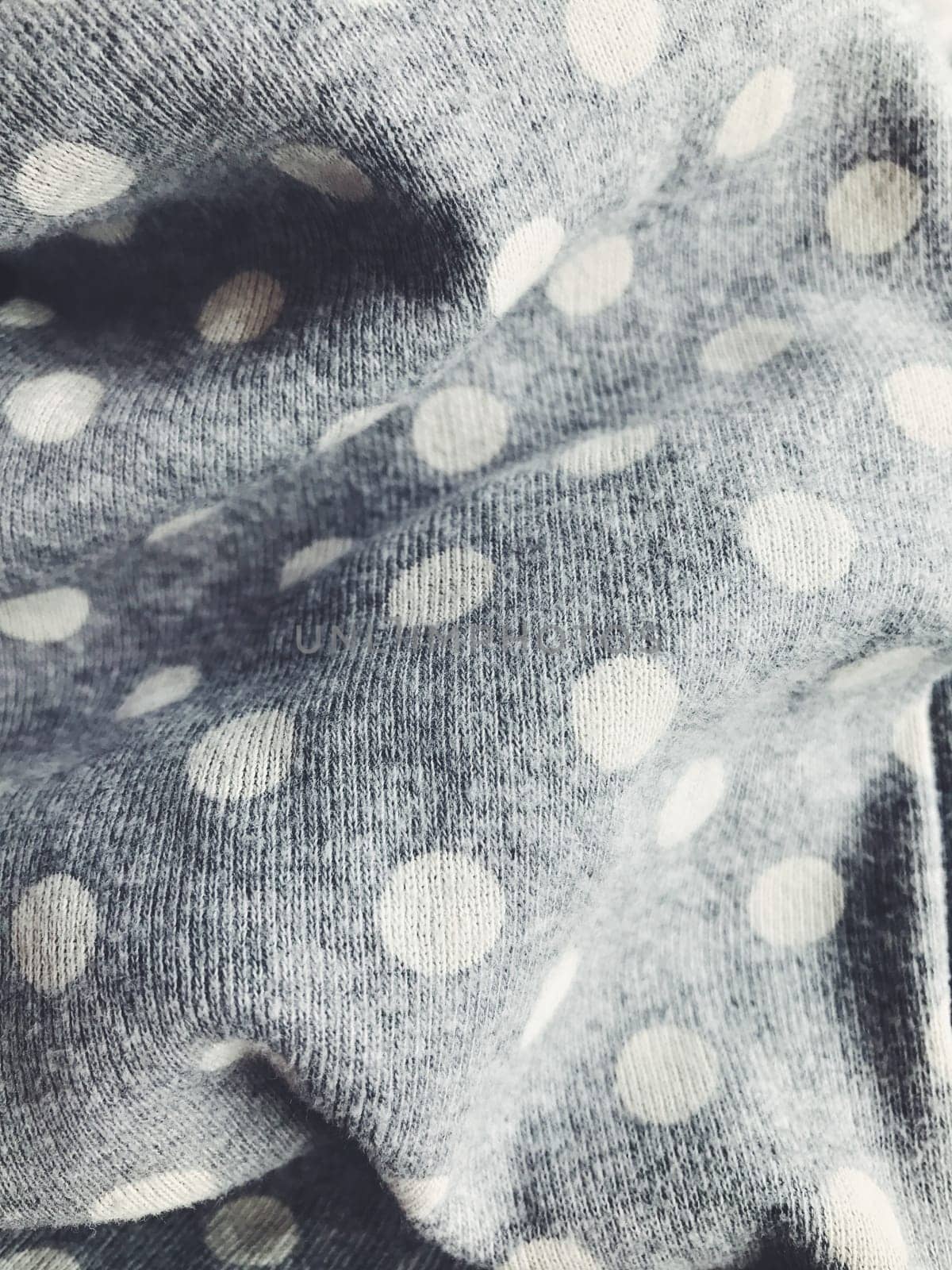 Textile fabric background. Ð¡asual simple everyday dotted polka clothers