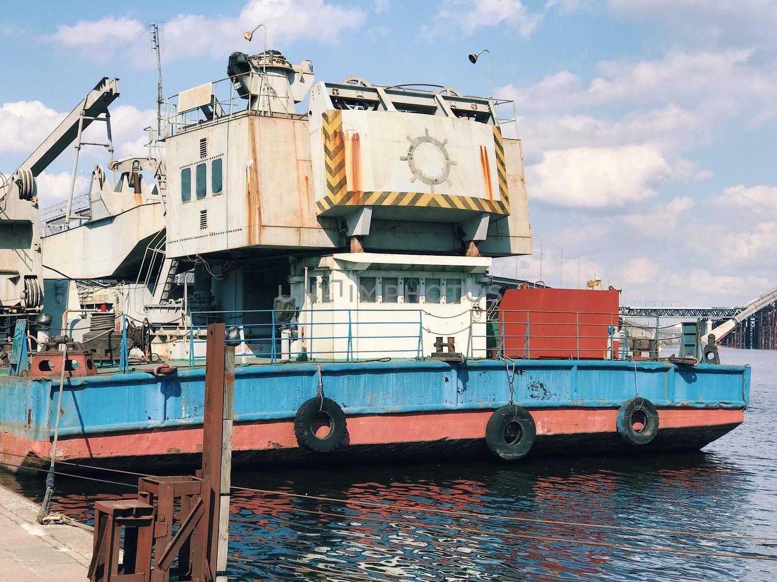 Rusty vintage abandoned ship ferry in old port