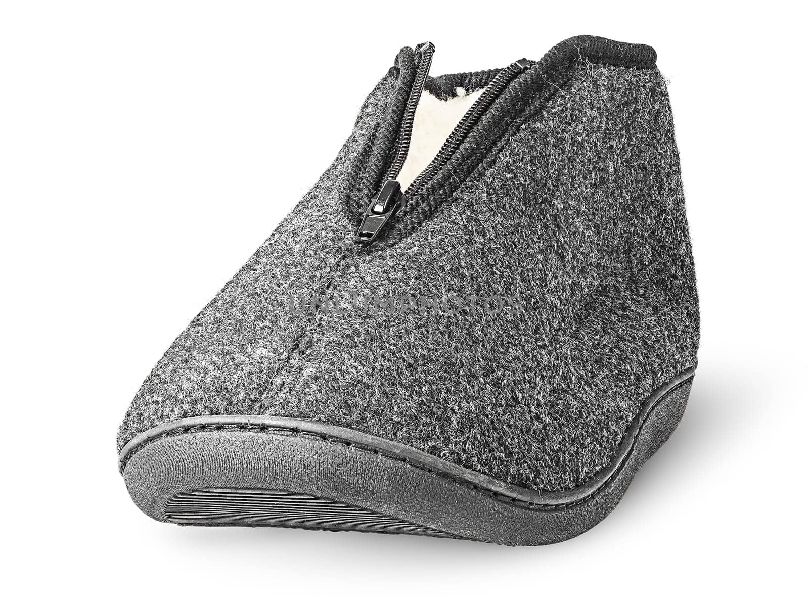 In front one piece the comfortable dark gray slipper isolated on white background