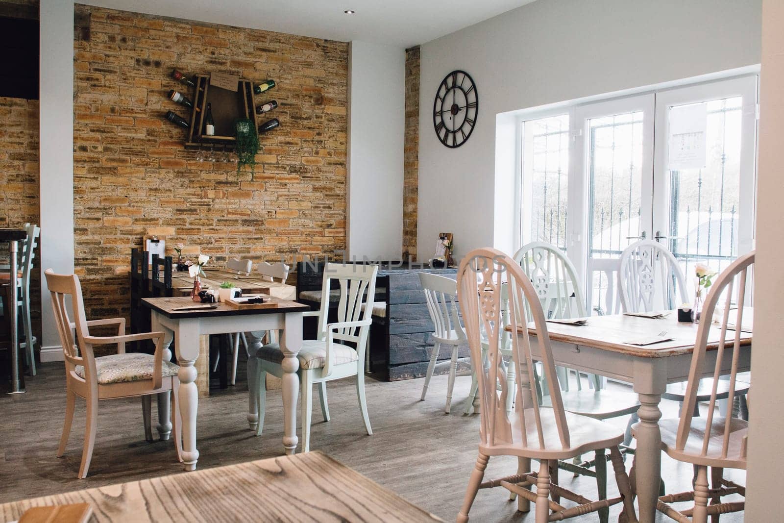 Interior shot of an empty cafe dining area.