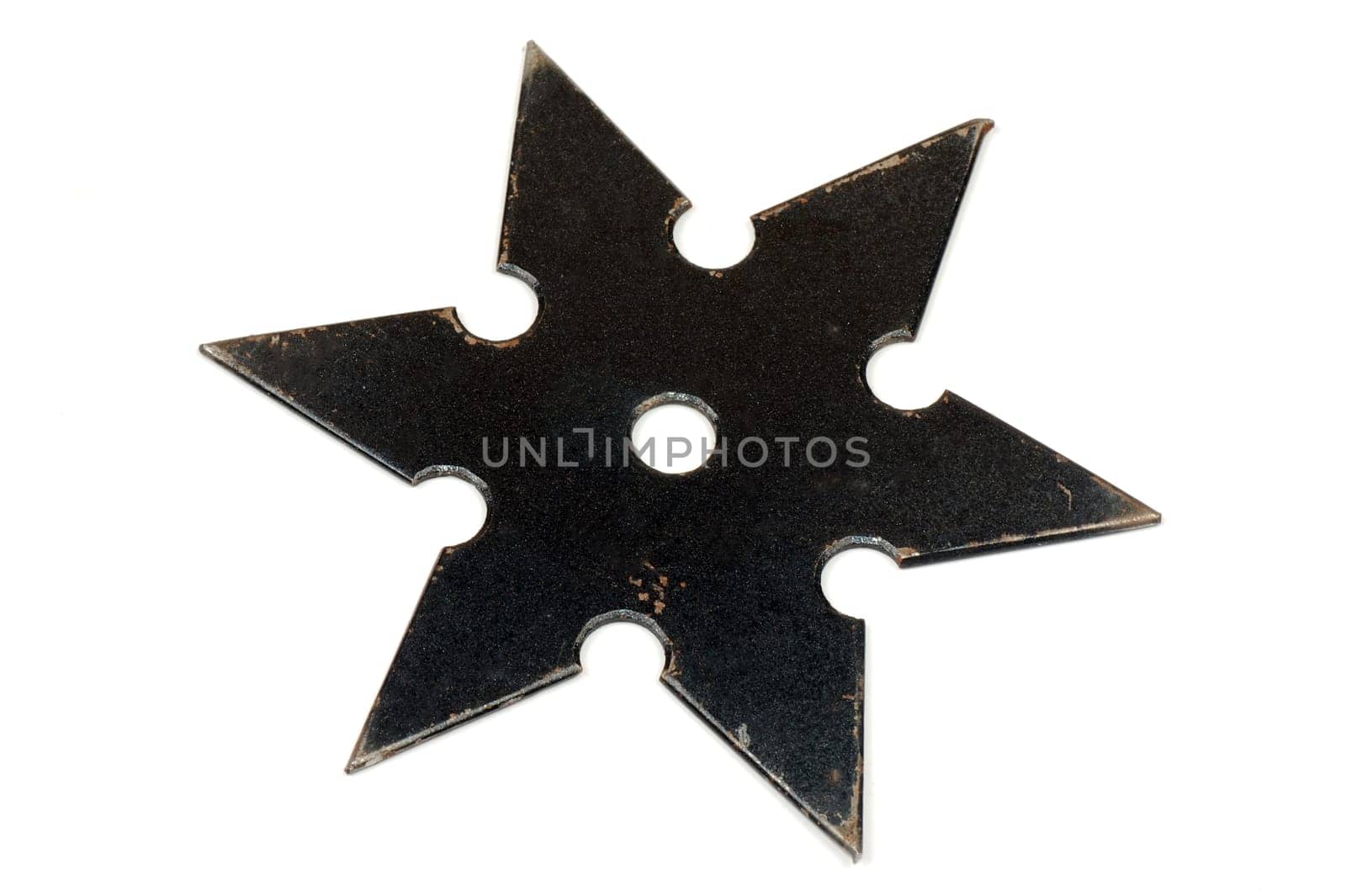 Black star shape shuriken on white background.