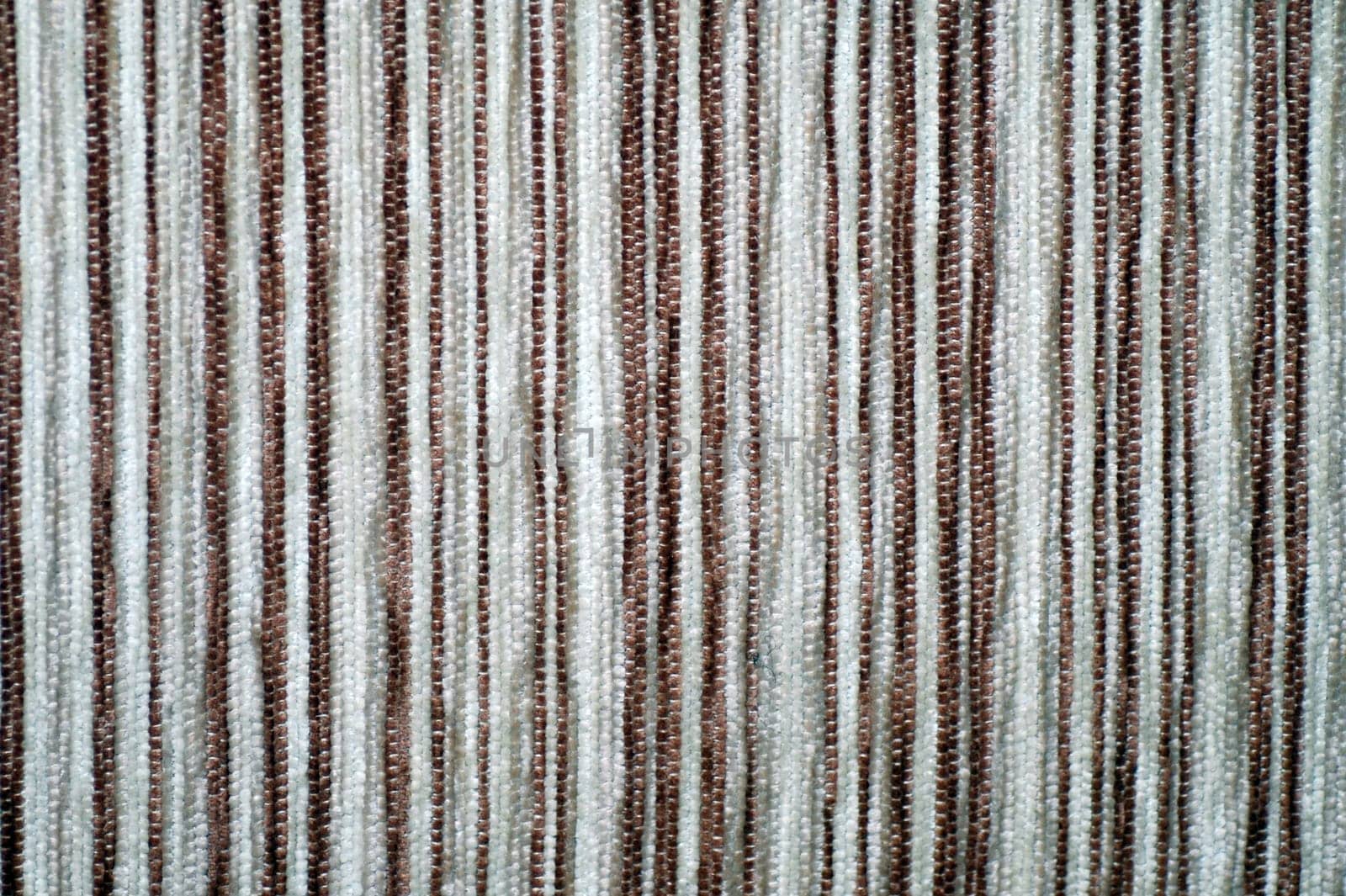 Textile with striped pattern as texture background.