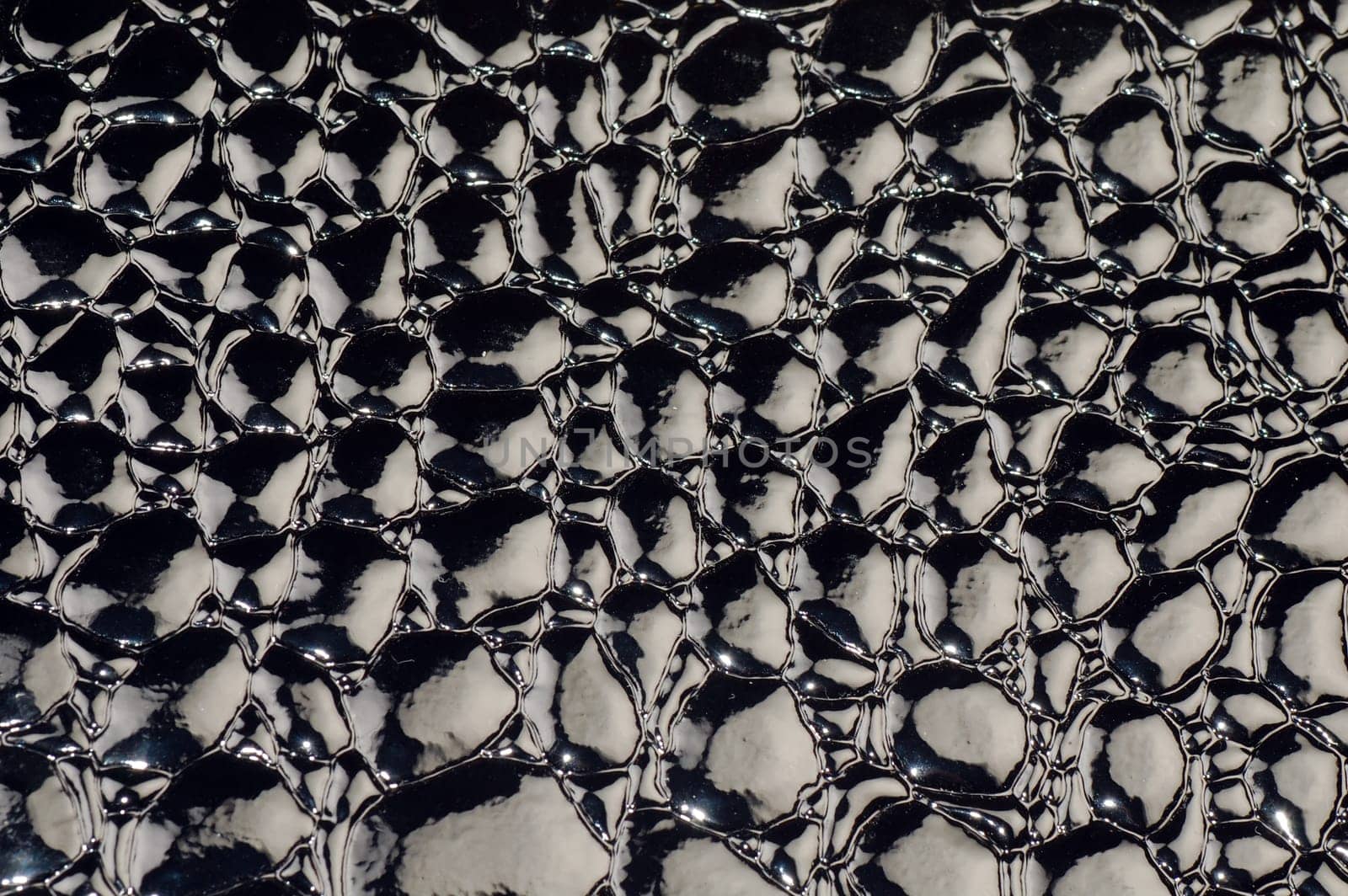 The black lacquered leather is as texture background.