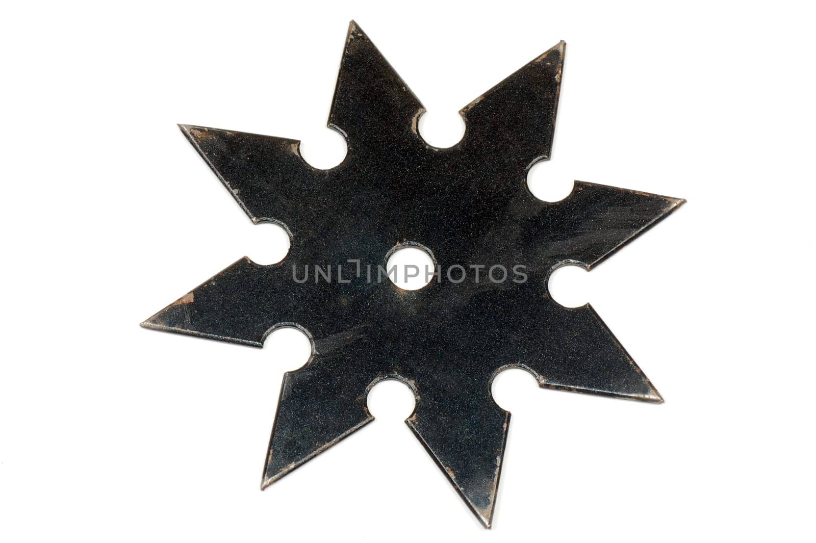 Black star shape shuriken on white background.