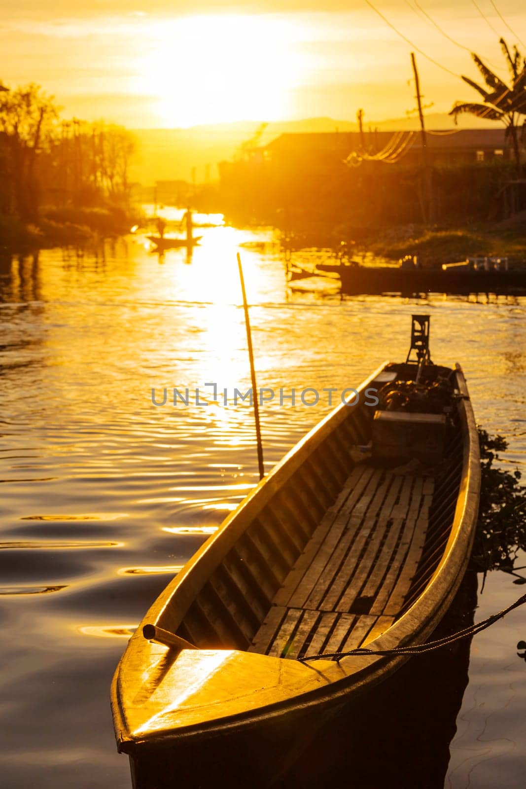 Traditional floating village at Inle Lake Sunset , Myanmar ( Burma )