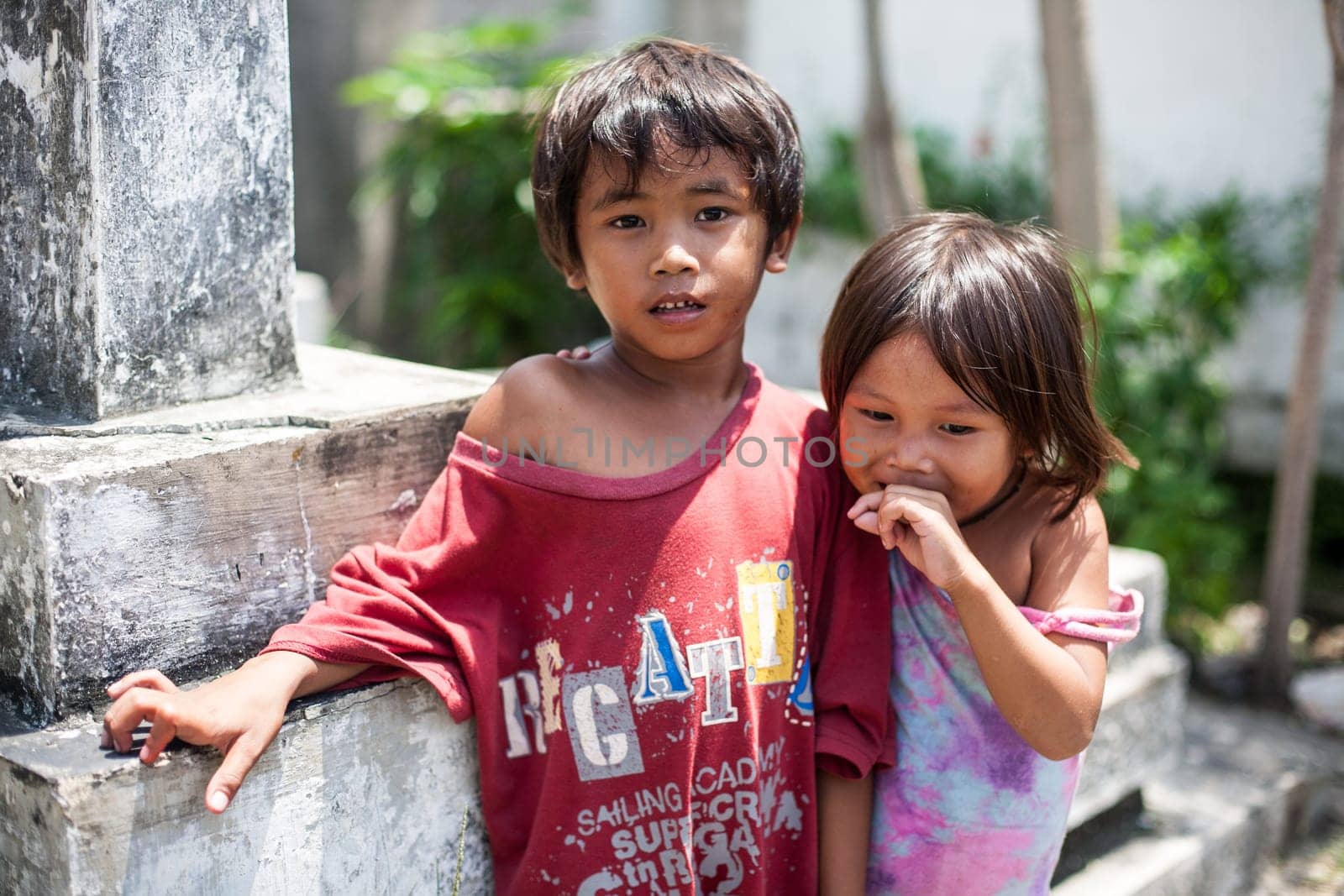 Cebu, Philippines - October 01, 2014. Children play in the yard. Everyday life of filipinos