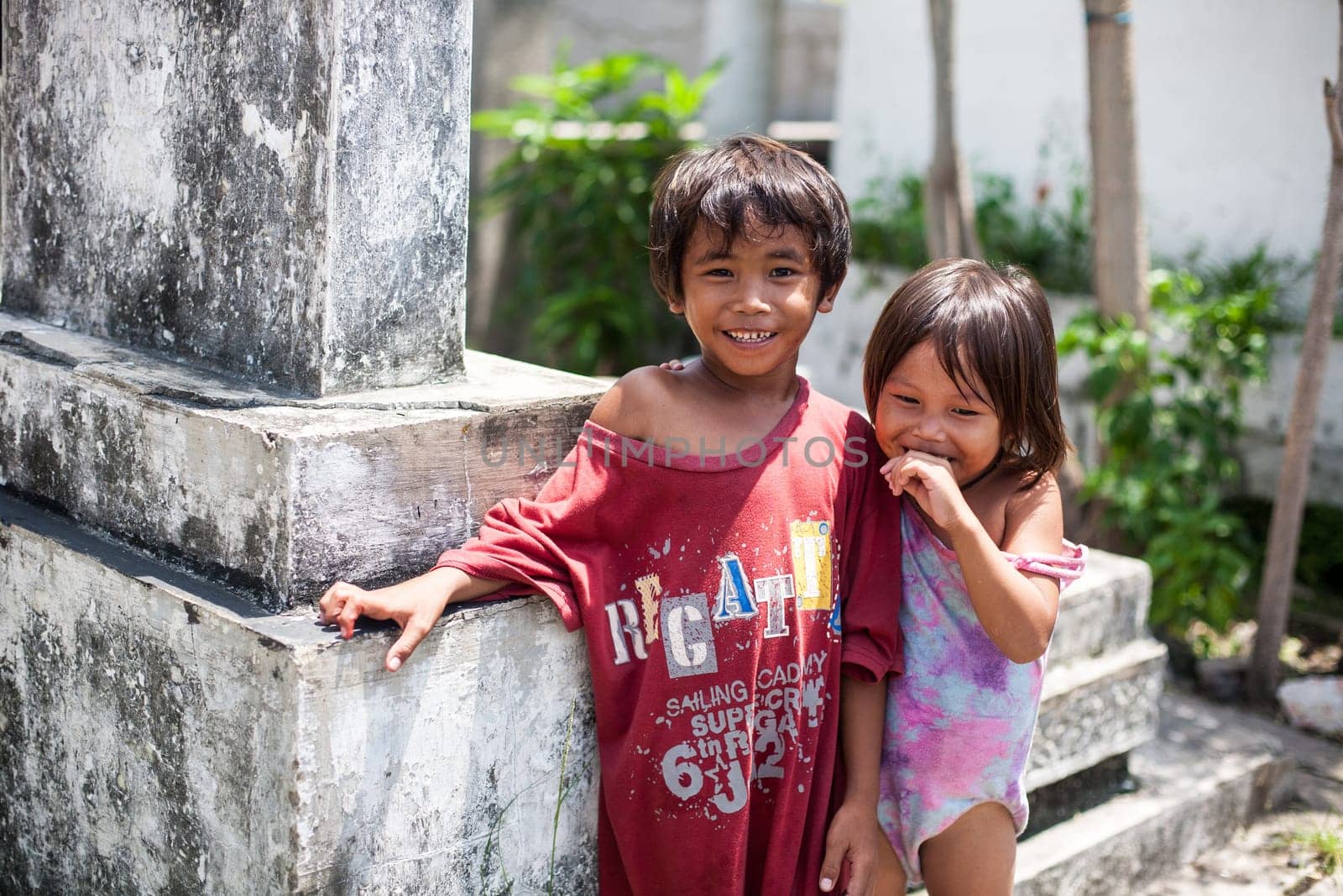 Cebu, Philippines - October 01, 2014. Children play in the yard. Everyday life of filipinos