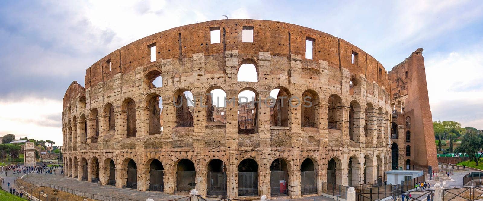 view on the Great Roman Colosseum Coliseum, Colosseo ,also known as the Flavian Amphitheatre. Famous world landmark. Scenic urban landscape. Rome. Italy. Europe