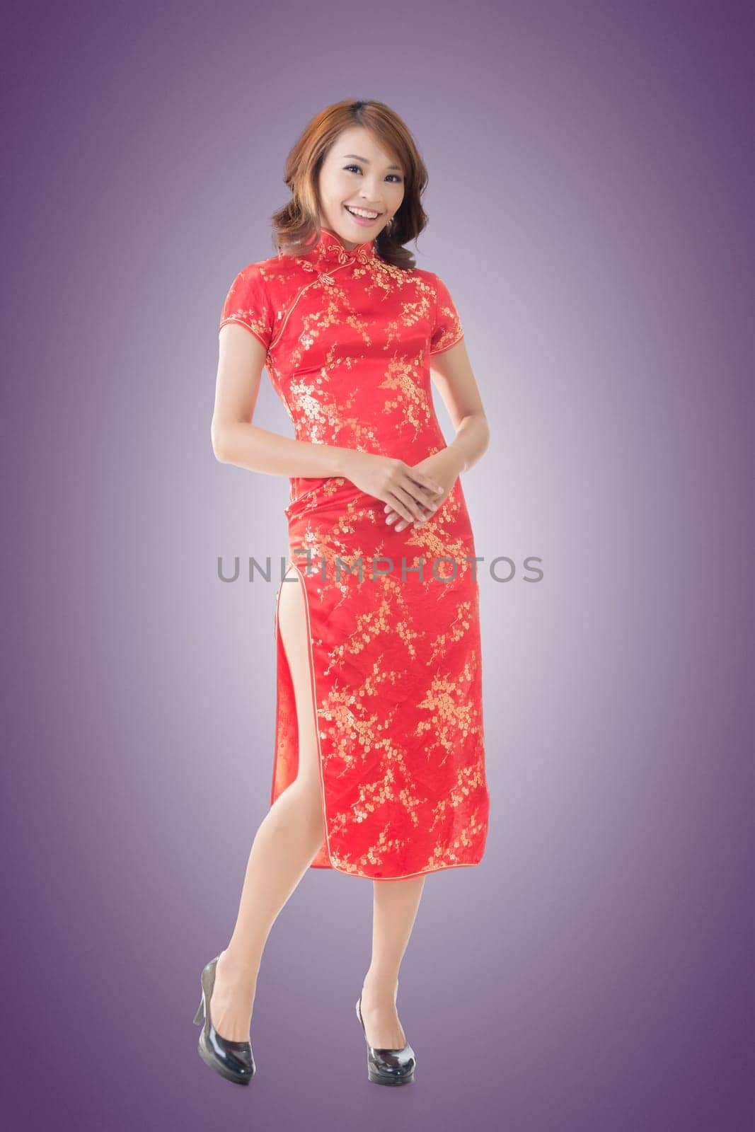 Chinese woman dress traditional cheongsam at New Year, full length portrait isolated.