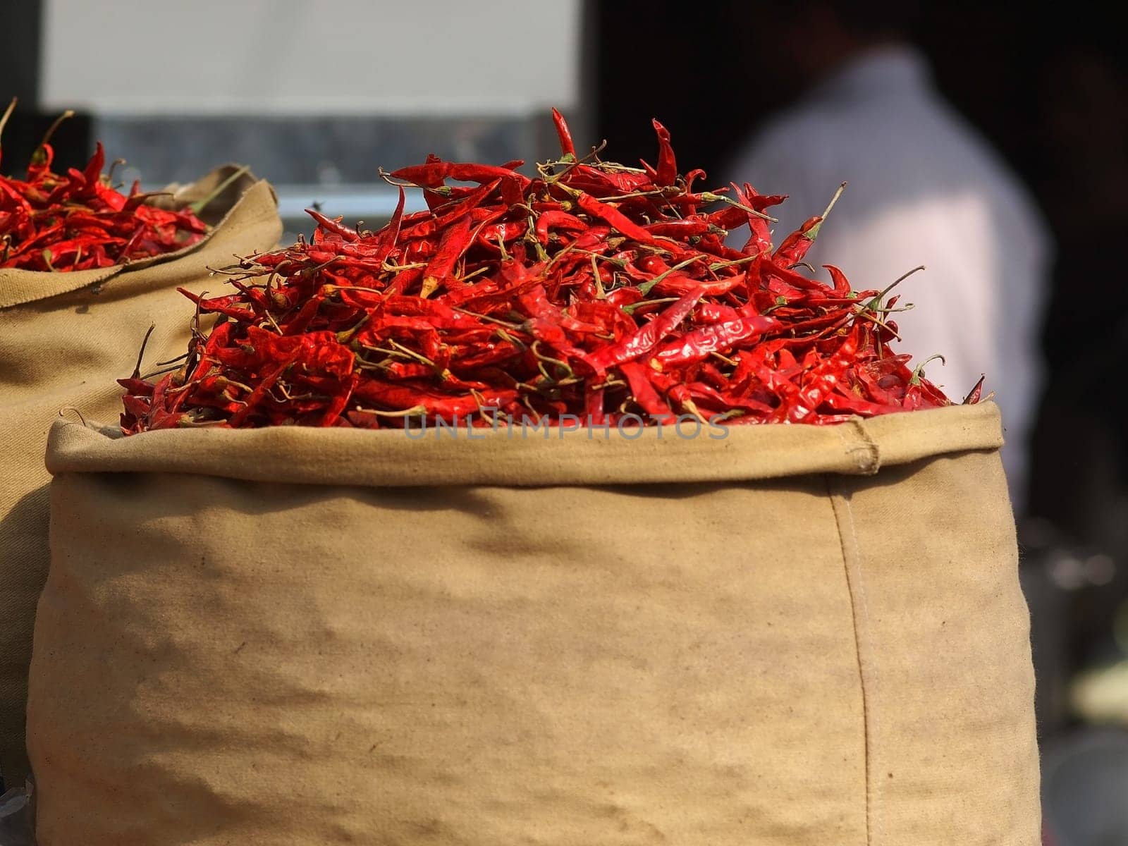 red chilly peppers in the yutta bag on the open market in Nepal
