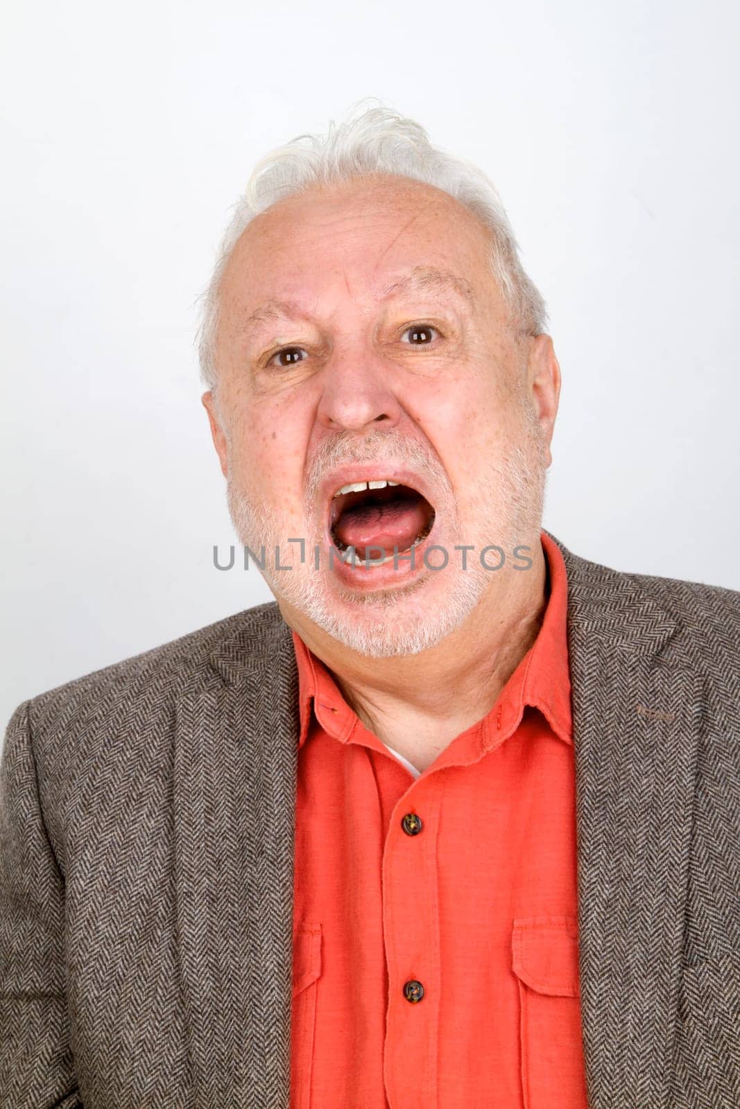 Screaming senior on a bright background