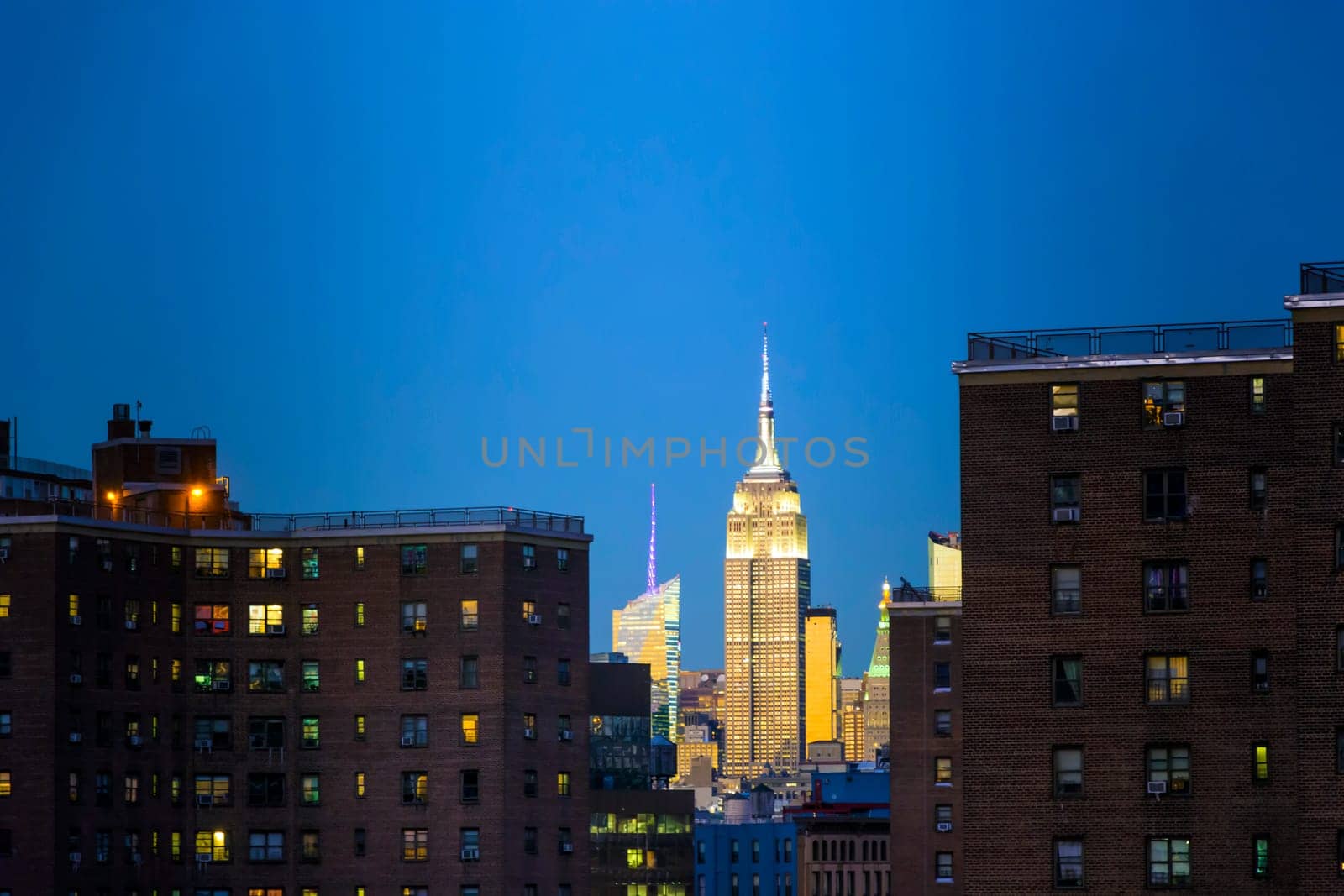 The iconic Empire state building at sunset