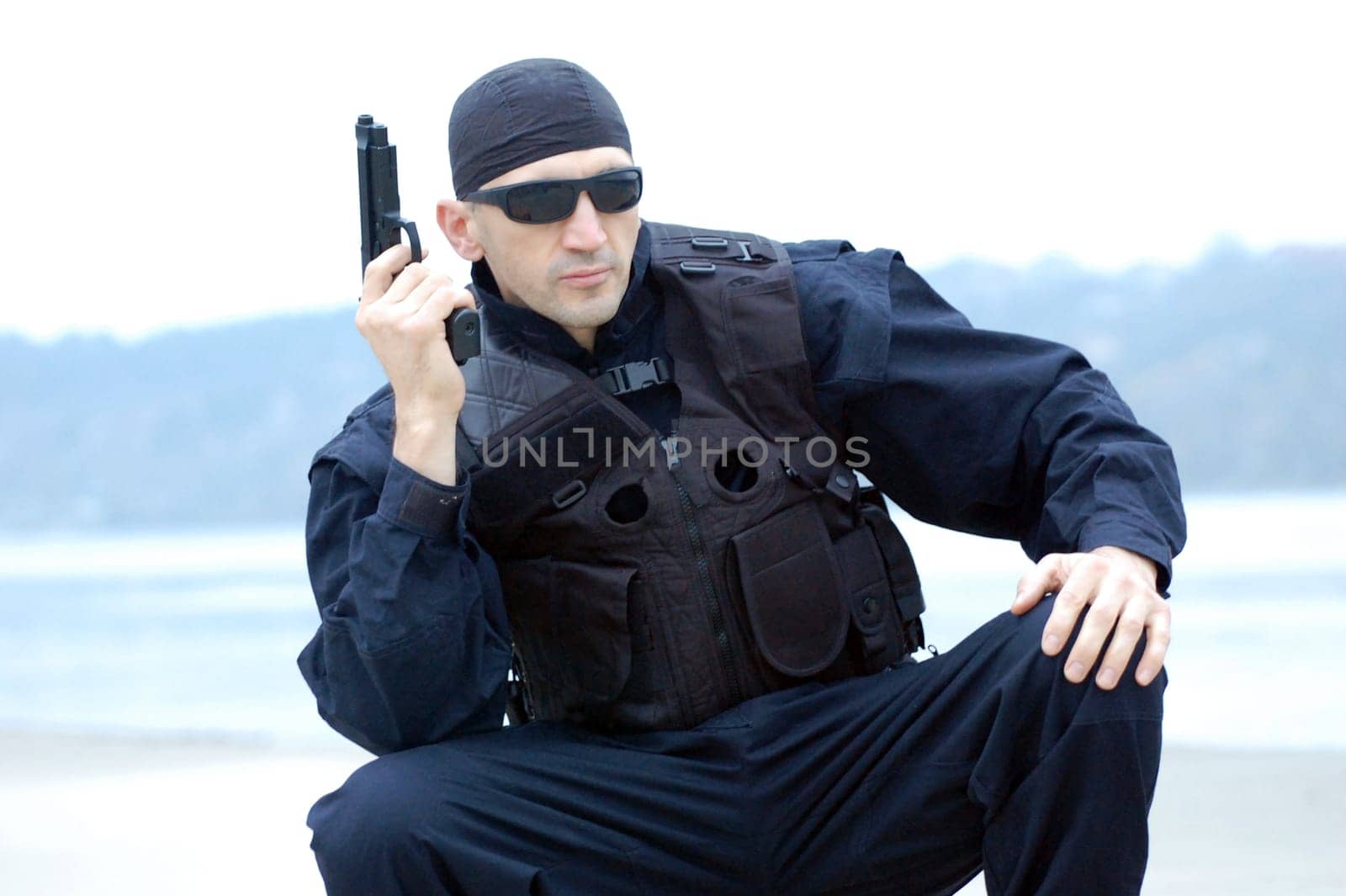 Security man with gun.
