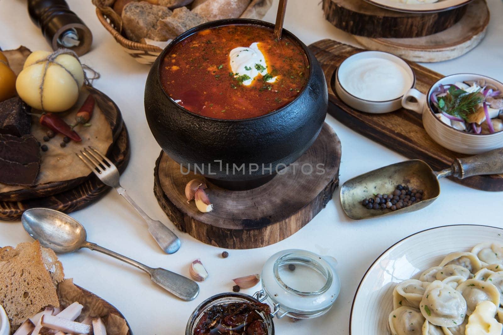 Russian borsch at pot on the table
