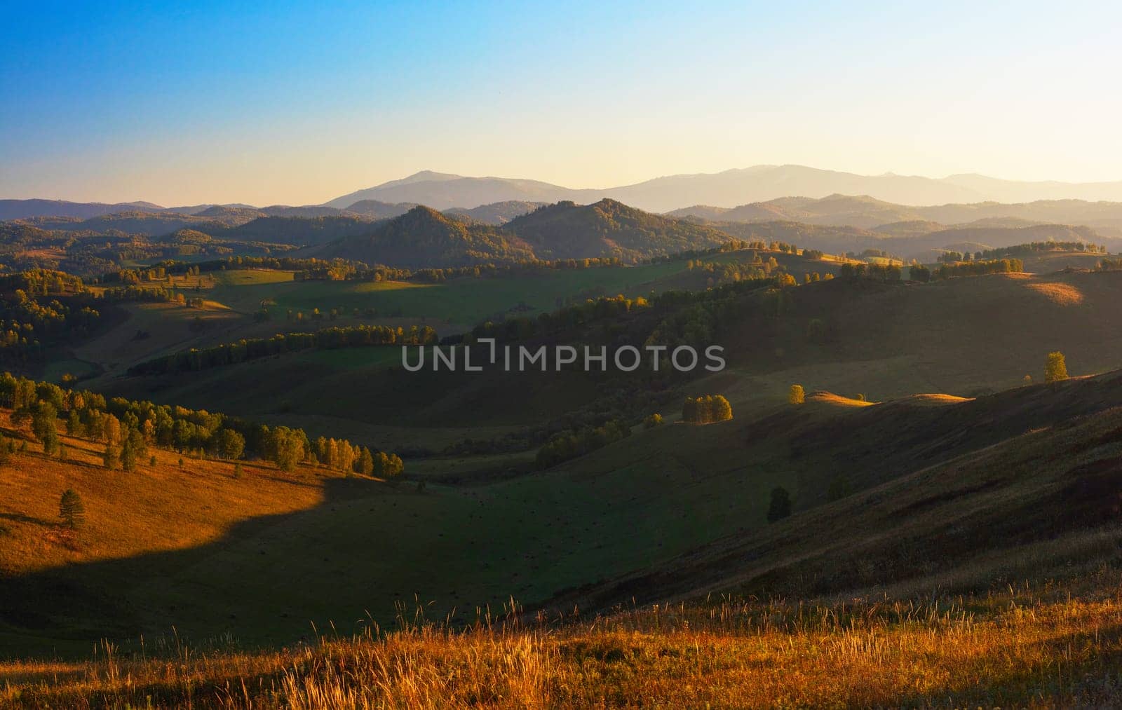 Beauty dawn in the mountains in Altay, panoramic picture