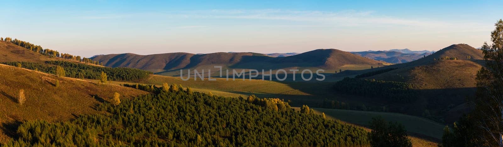 Beauty dawn in the mountains in Altay, panoramic picture