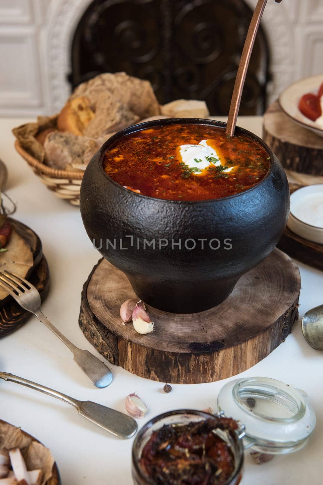 Russian borsch at pot on the table
