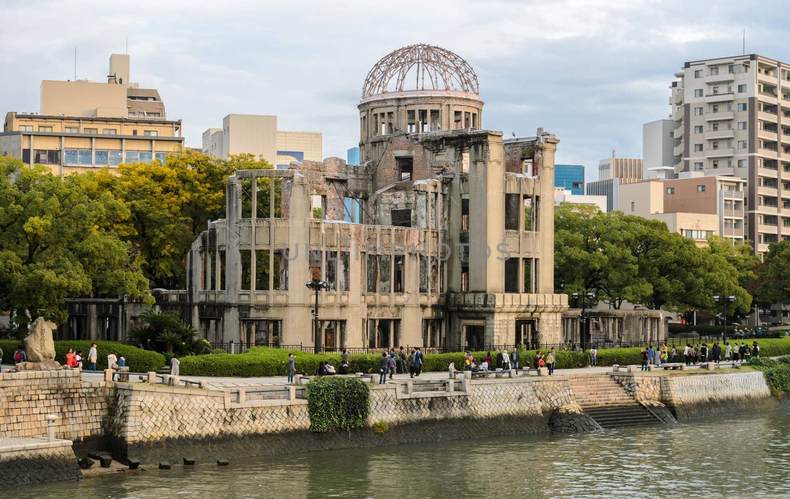 HIROSHIMA, JAPAN - NOVEMBER 19, 2016: Atomic bomb dome at Peace memorial park during autumn season in Hiroshima, Japan. Ruins of Hiroshima Prefectural Industrial Promotion Hall, UNESCO World Heritage Site
