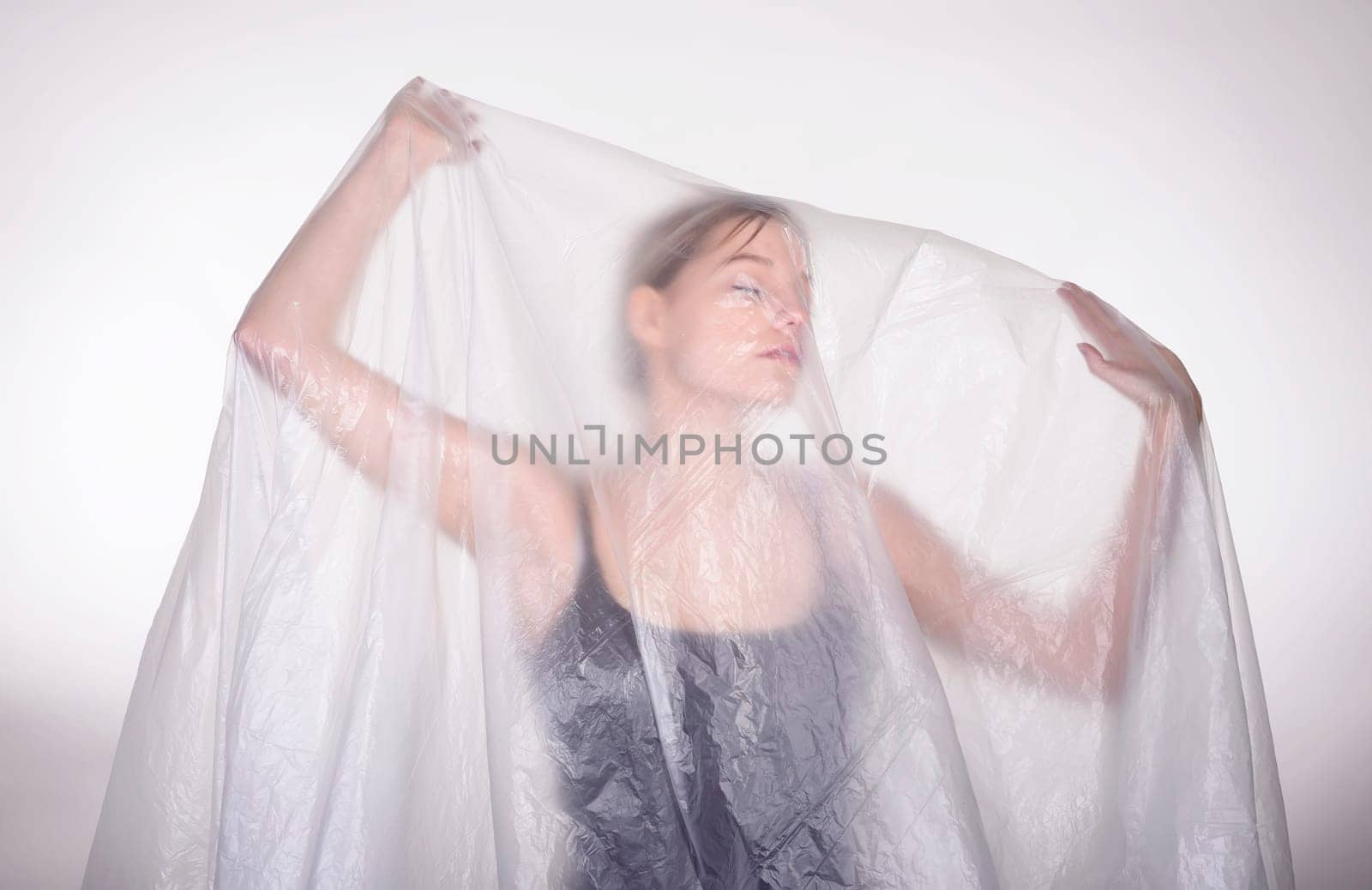 Woman behind foil