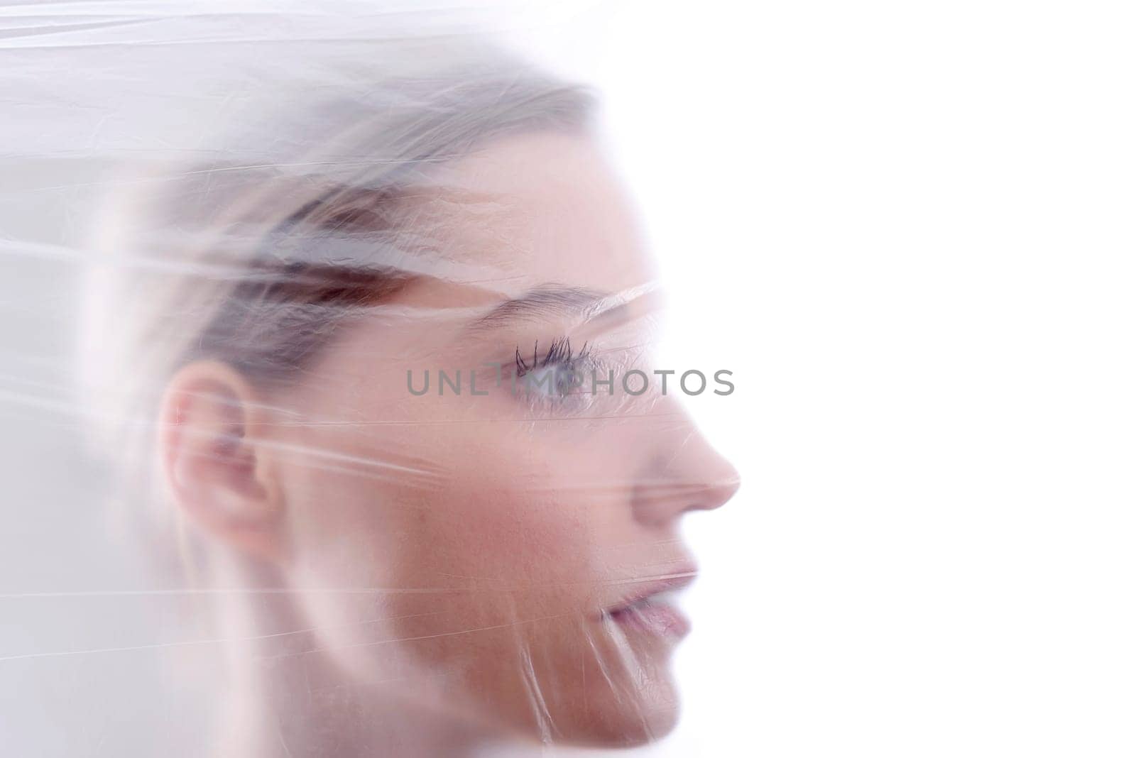 Woman behind foil