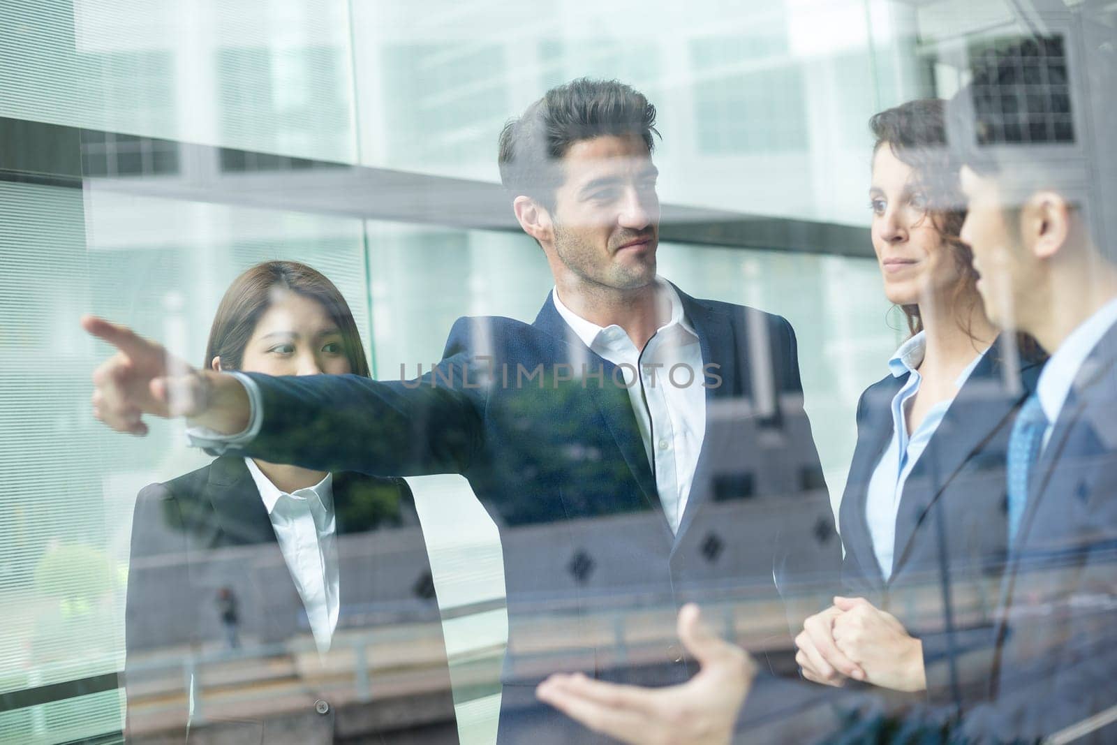 Group of Business people discuss inside office