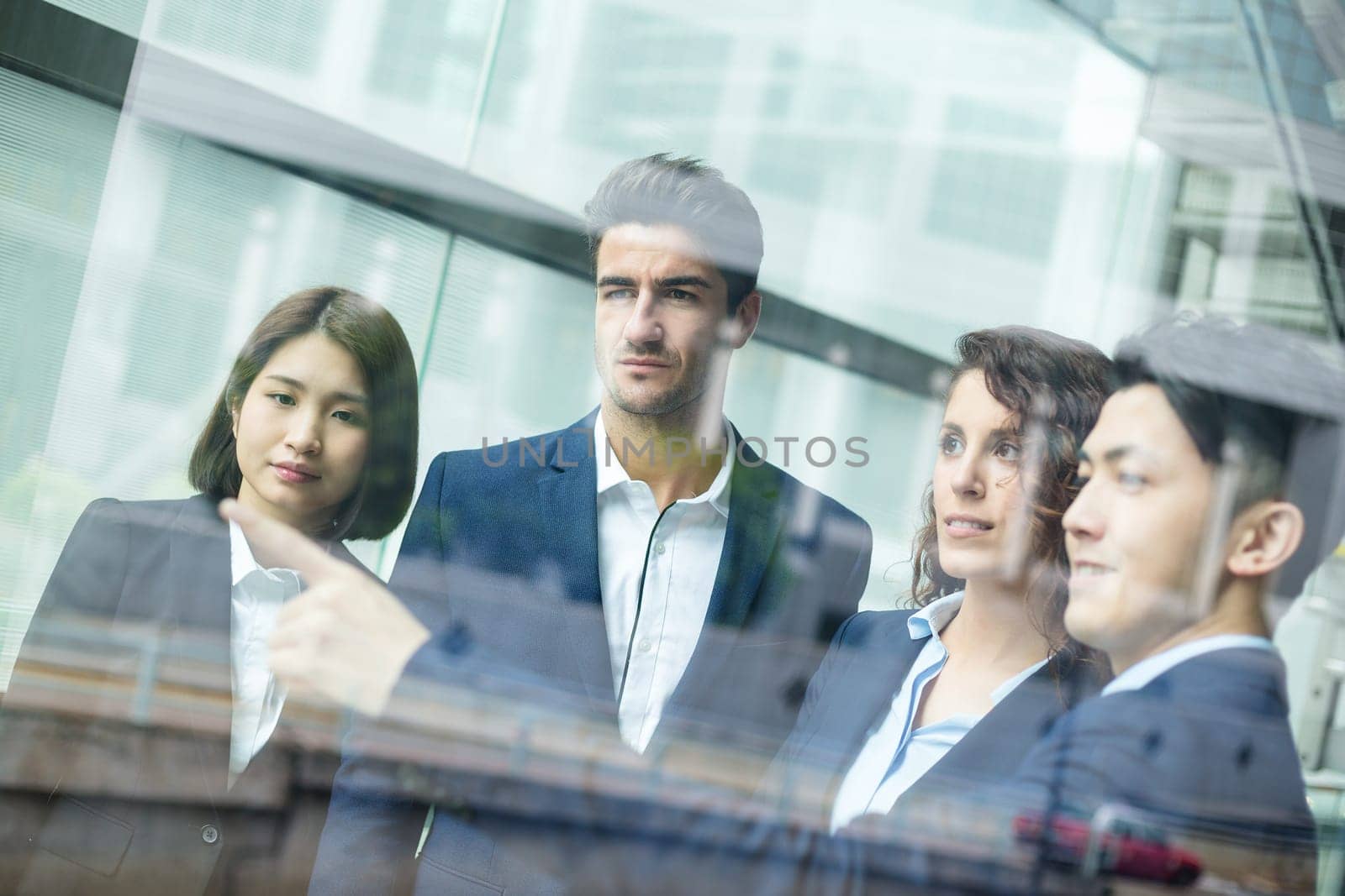 Business people discuss inside office