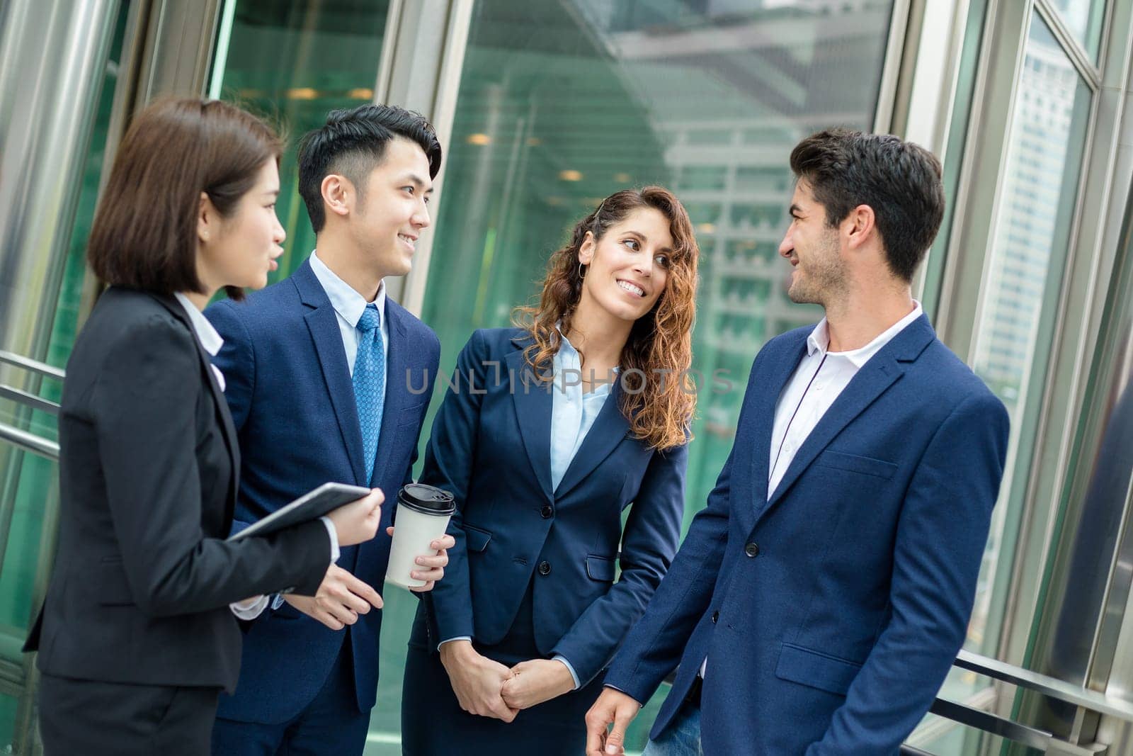 Group of business team talking to each other