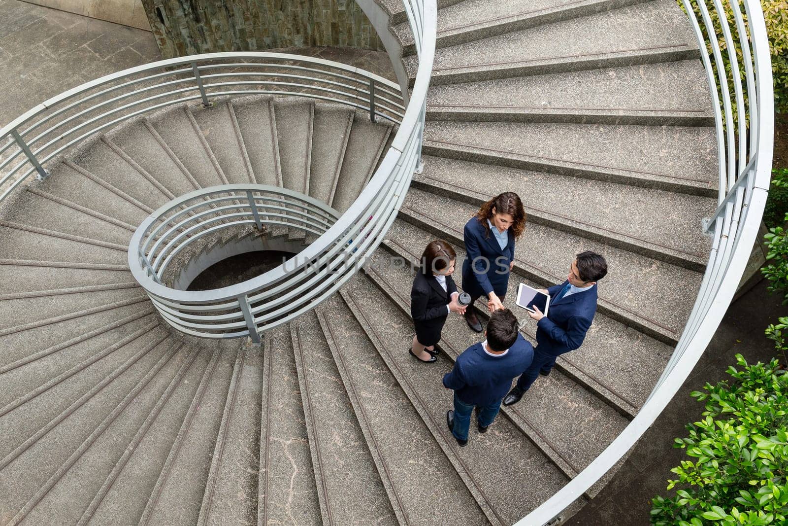 Top view of business people standing on step