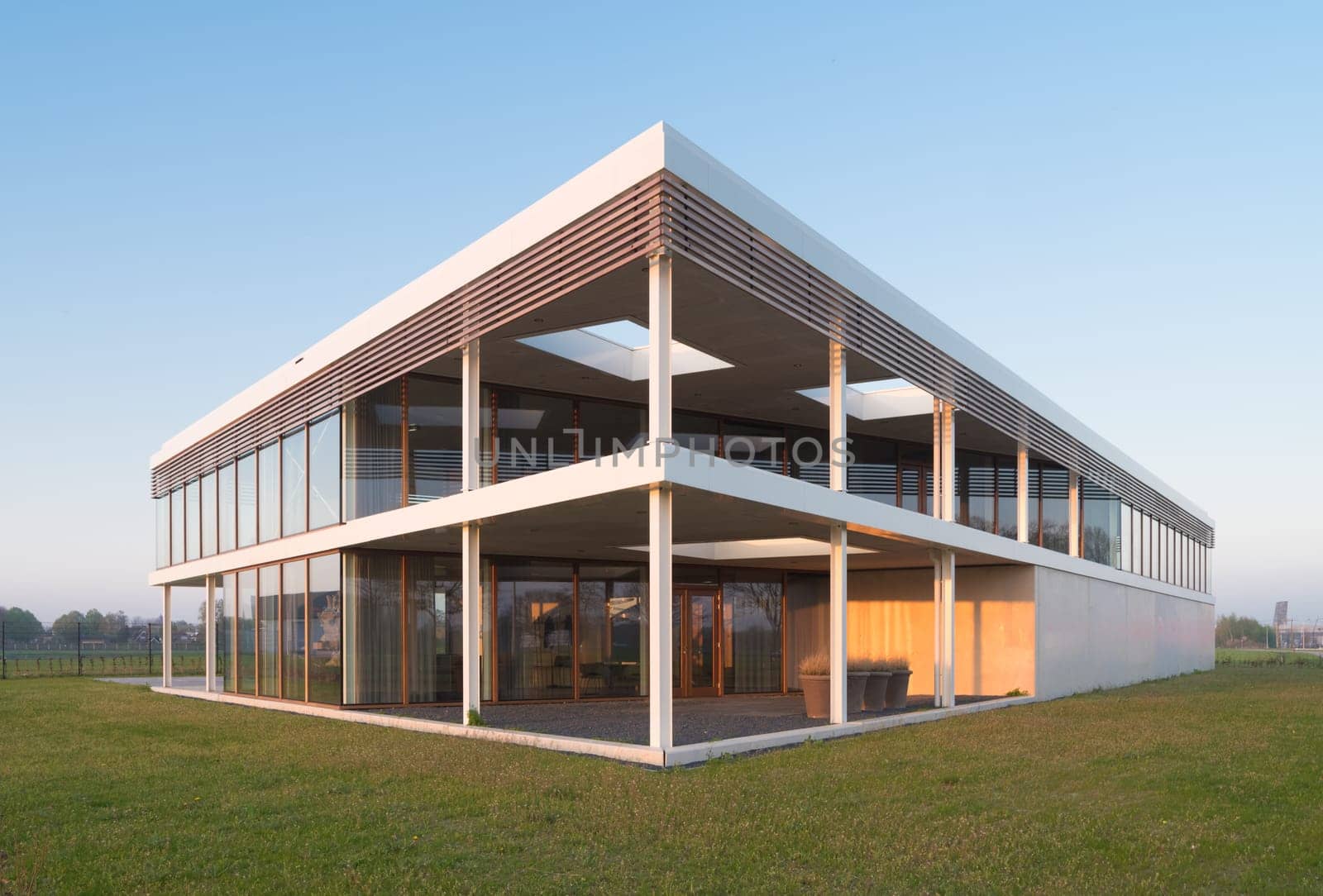 modern newly build office building in sunset light
