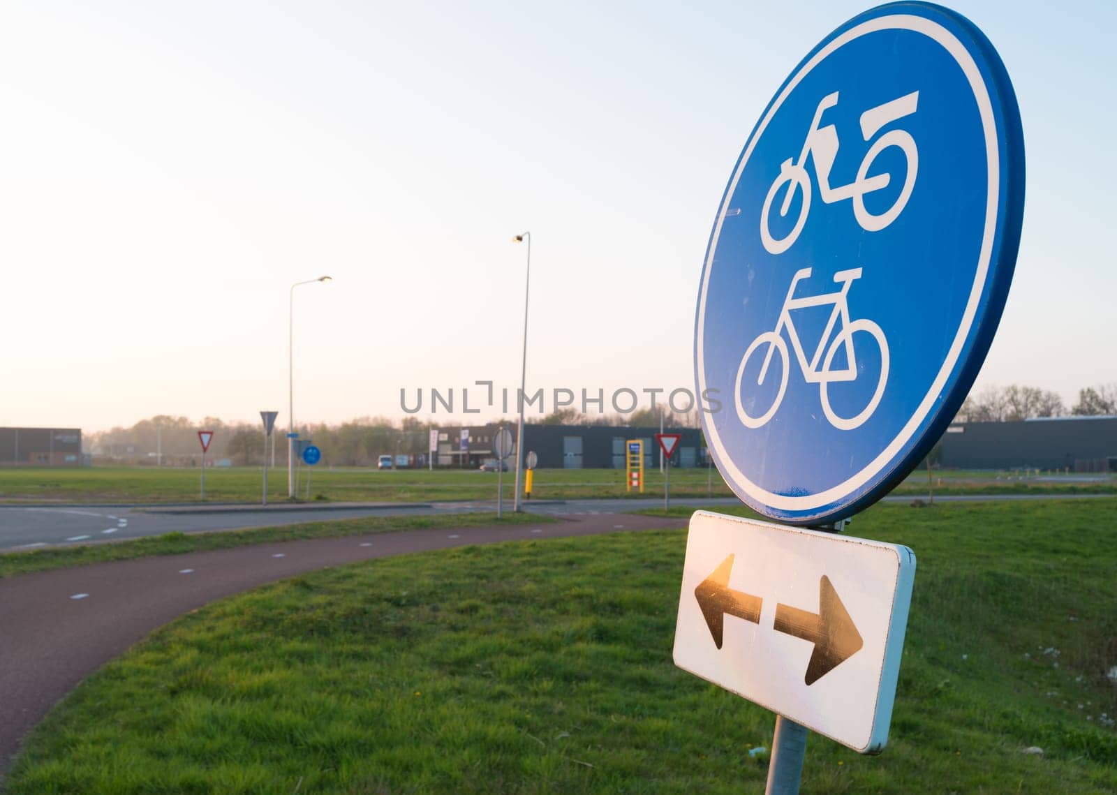blue traffic sign for bicycles and mopeds, in both directions